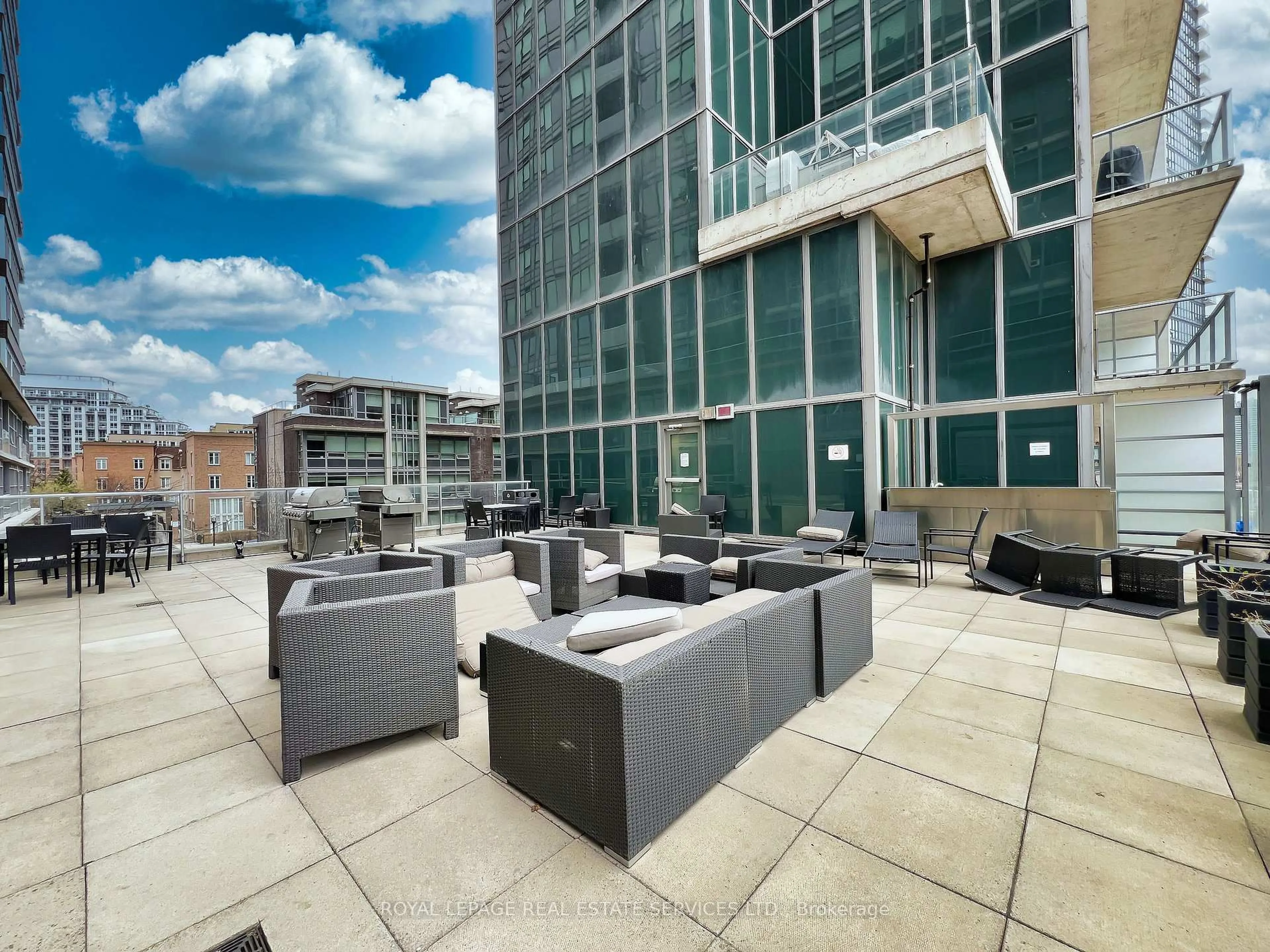 Patio, city buildings view from balcony for 135 East Liberty St #2310, Toronto Ontario M6K 0G7