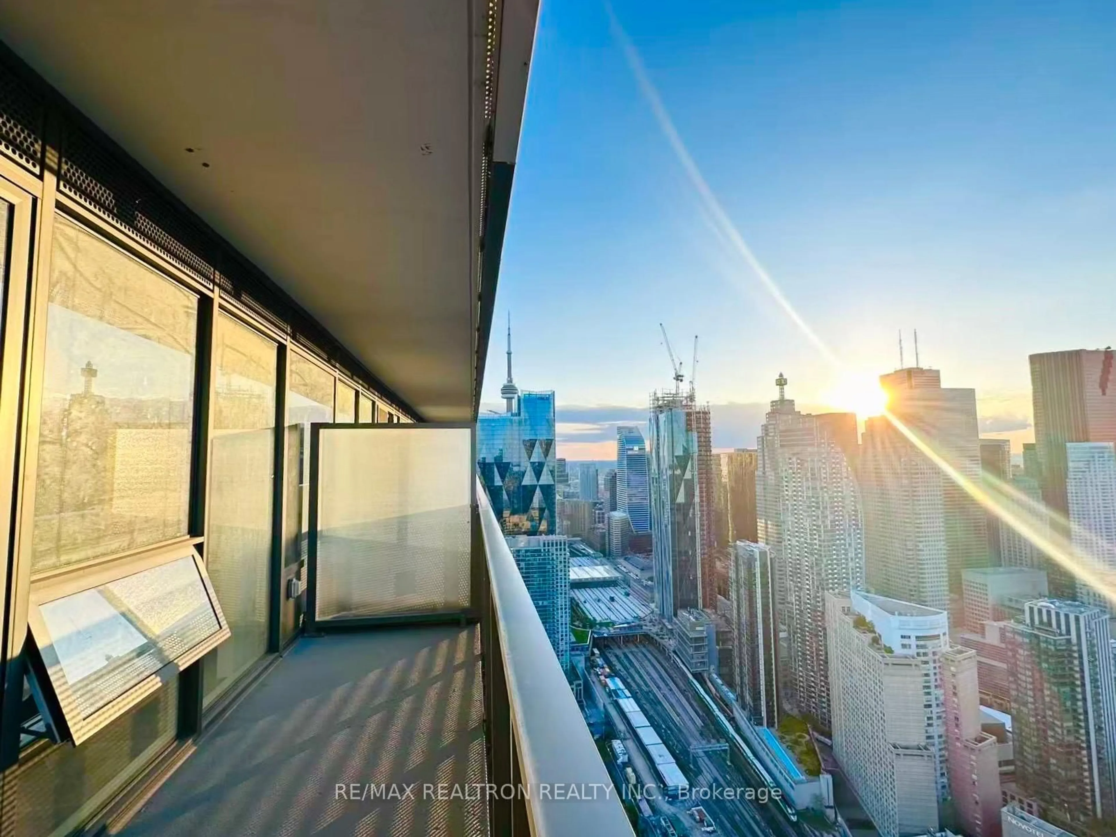 Balcony in the apartment, city buildings view from balcony for 55 Cooper St #6303, Toronto Ontario M5E 0G1