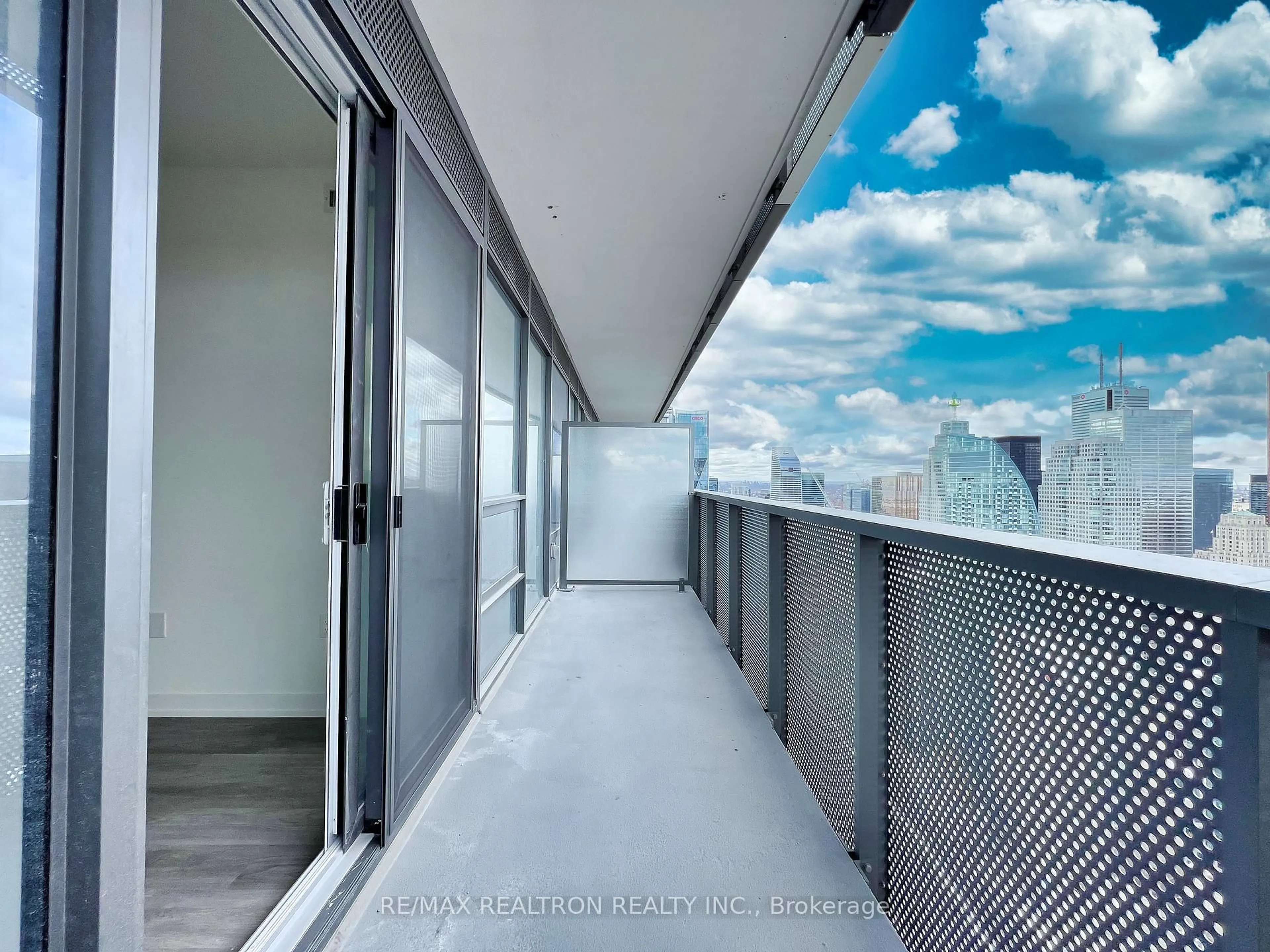 Balcony in the apartment, city buildings view from balcony for 55 Cooper St #6303, Toronto Ontario M5E 0G1