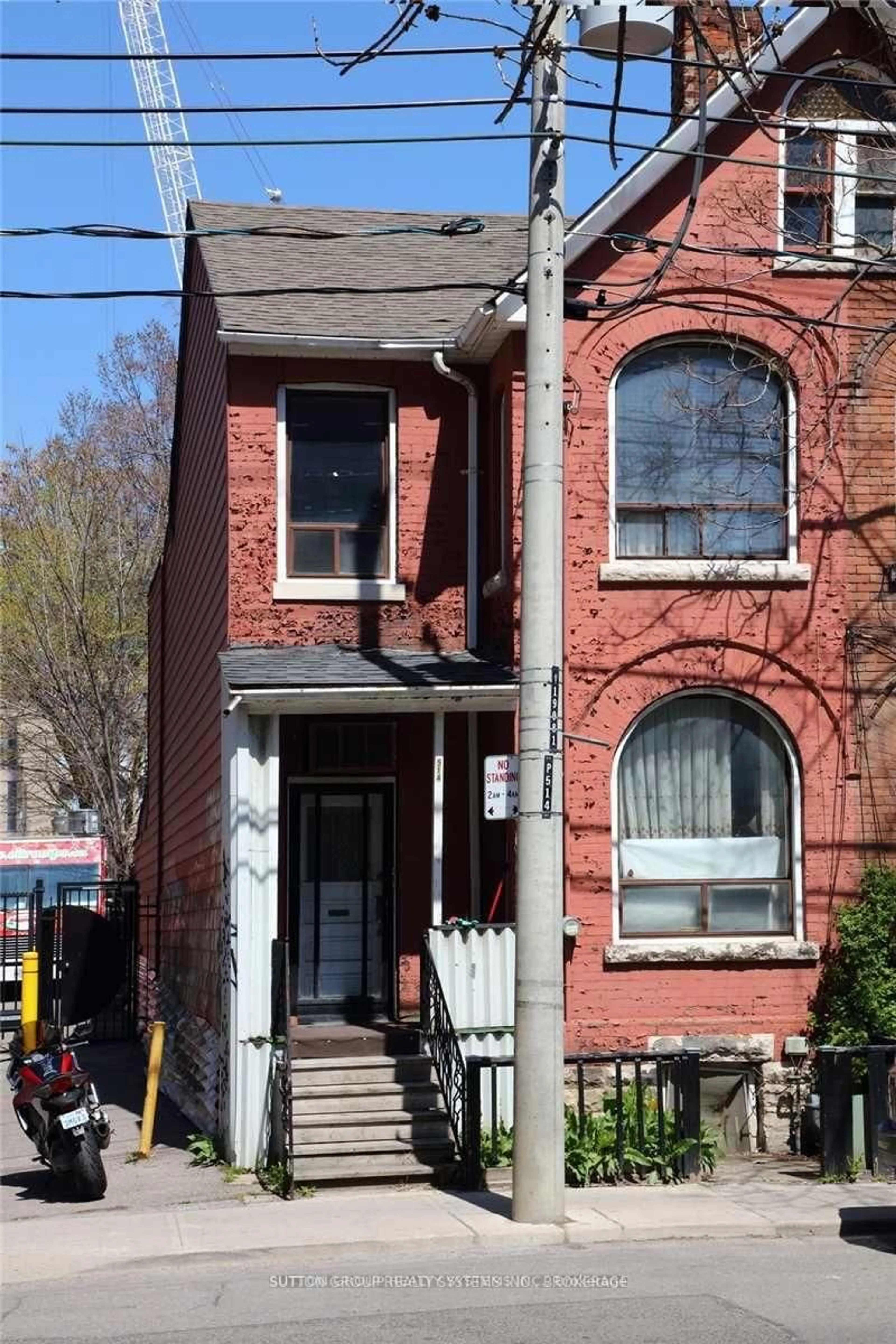 Home with brick exterior material, street for 514 Adelaide St, Toronto Ontario M5V 1T5