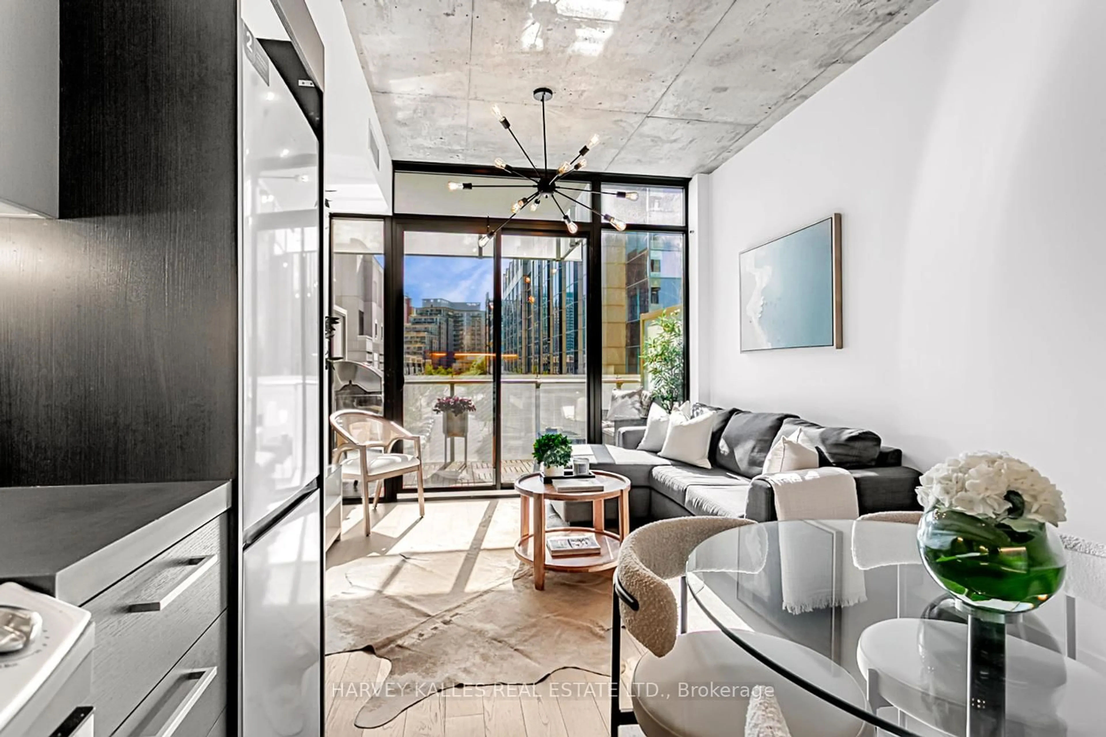 Living room with furniture, cement floor for 25 Stafford St #406, Toronto Ontario M5V 0G3