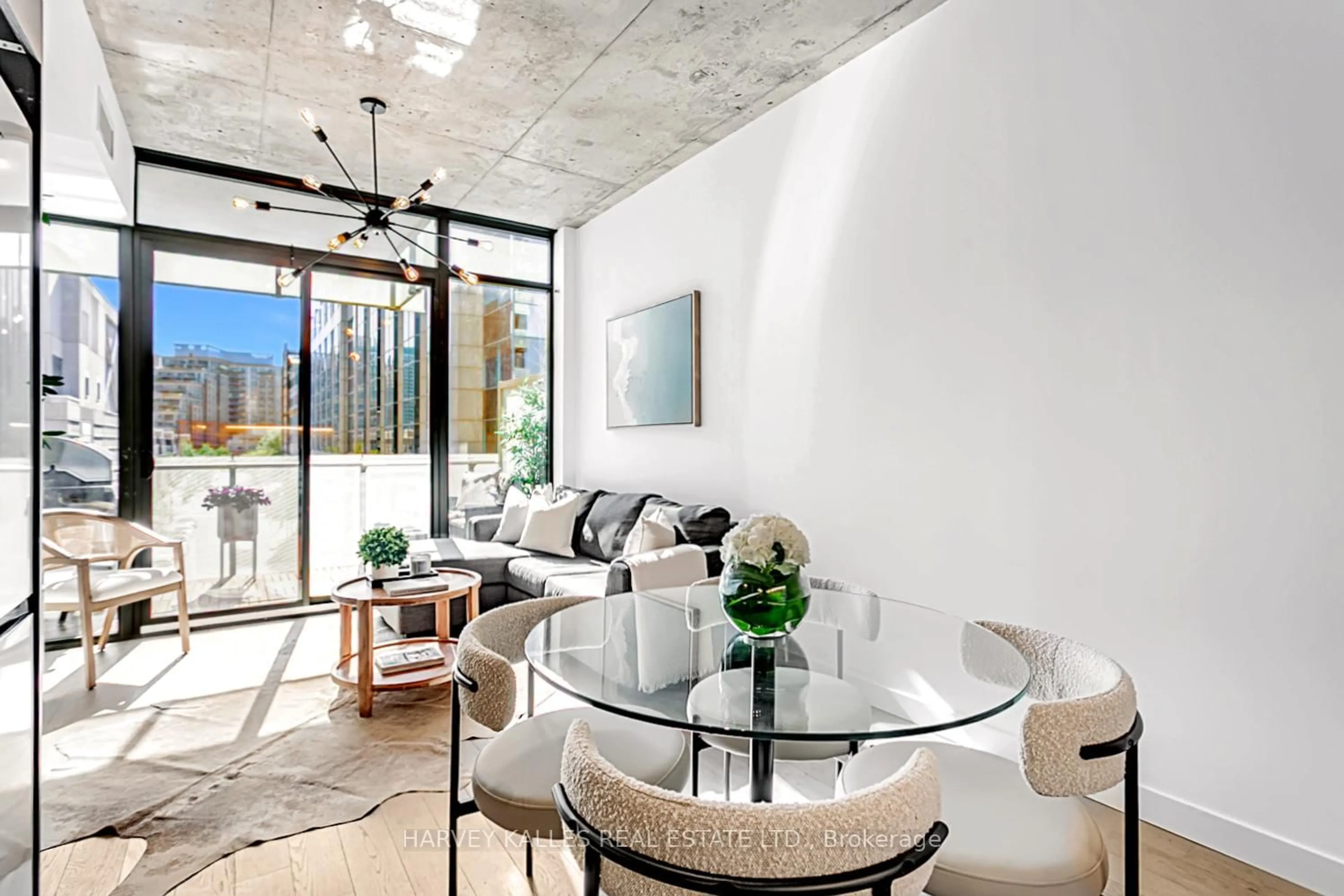Living room with furniture, cement floor for 25 Stafford St #406, Toronto Ontario M5V 0G3