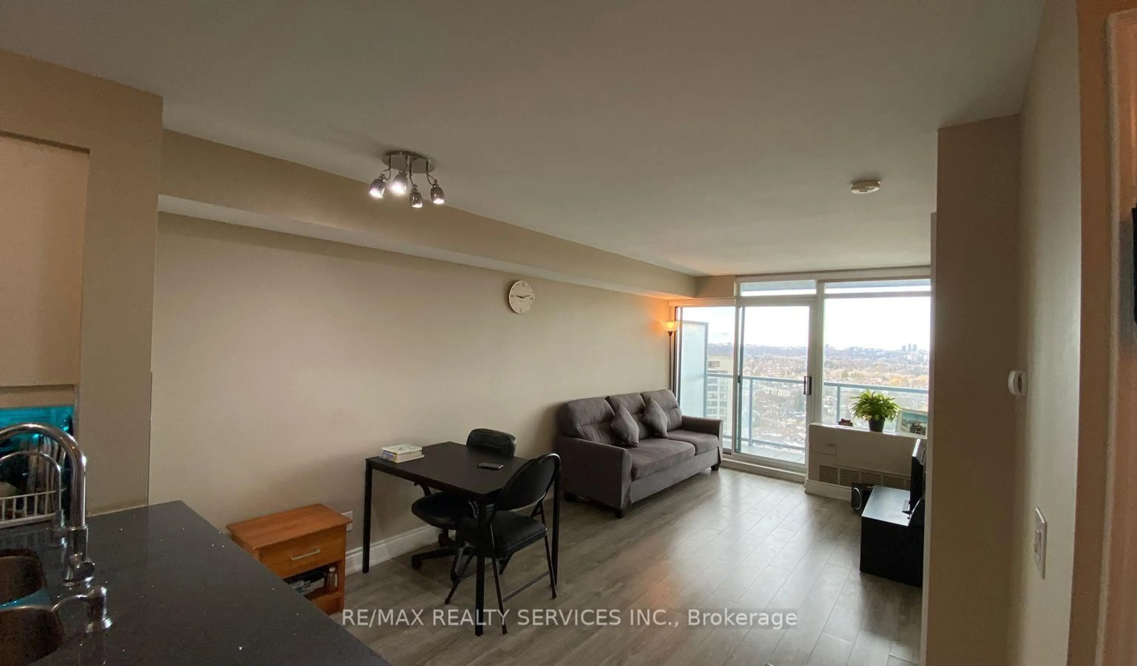 Living room with furniture, wood/laminate floor for 5500 Yonge St #2307, Toronto Ontario M2N 7L1
