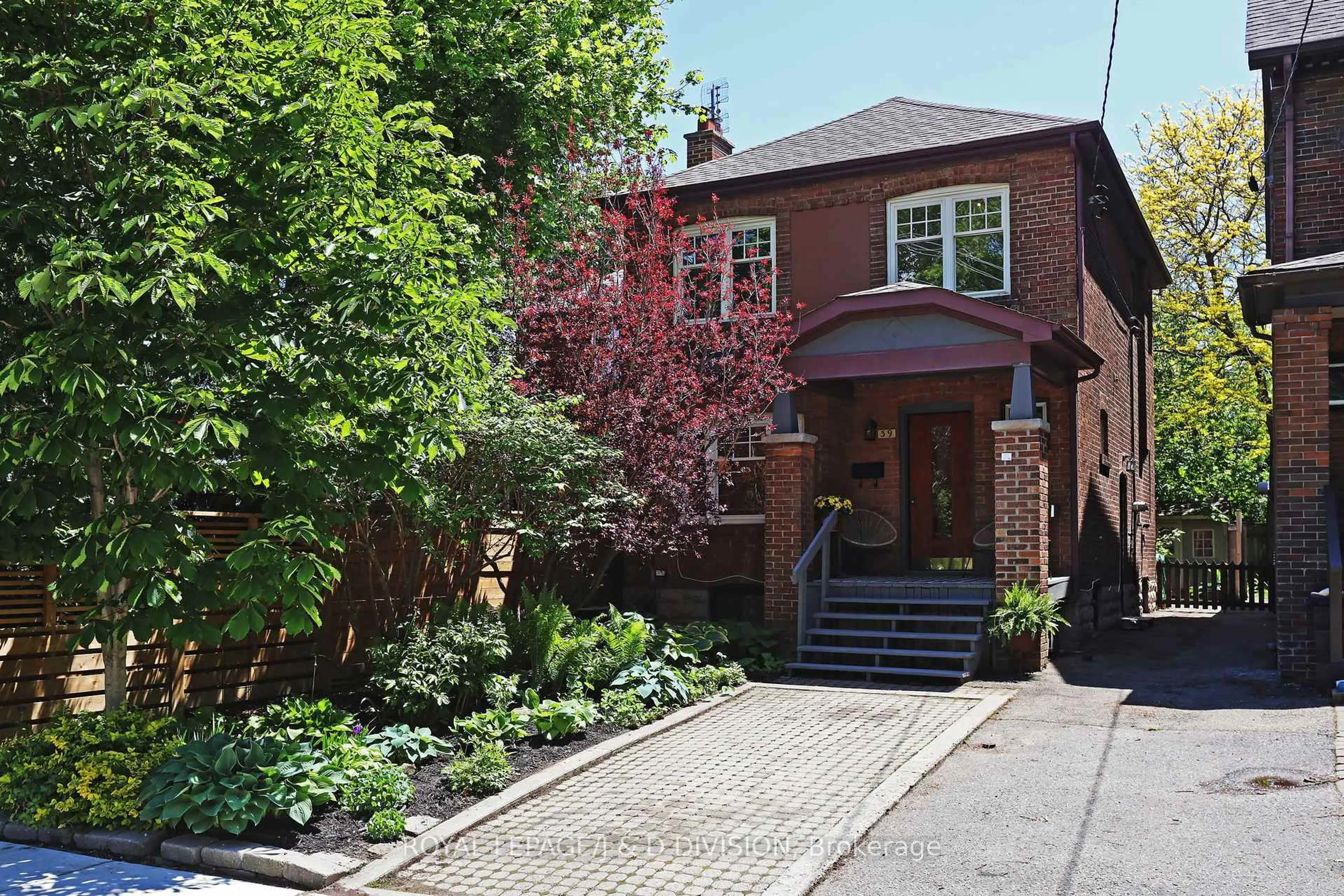 Home with brick exterior material, street for 39 Tilson Rd, Toronto Ontario M4S 1P3