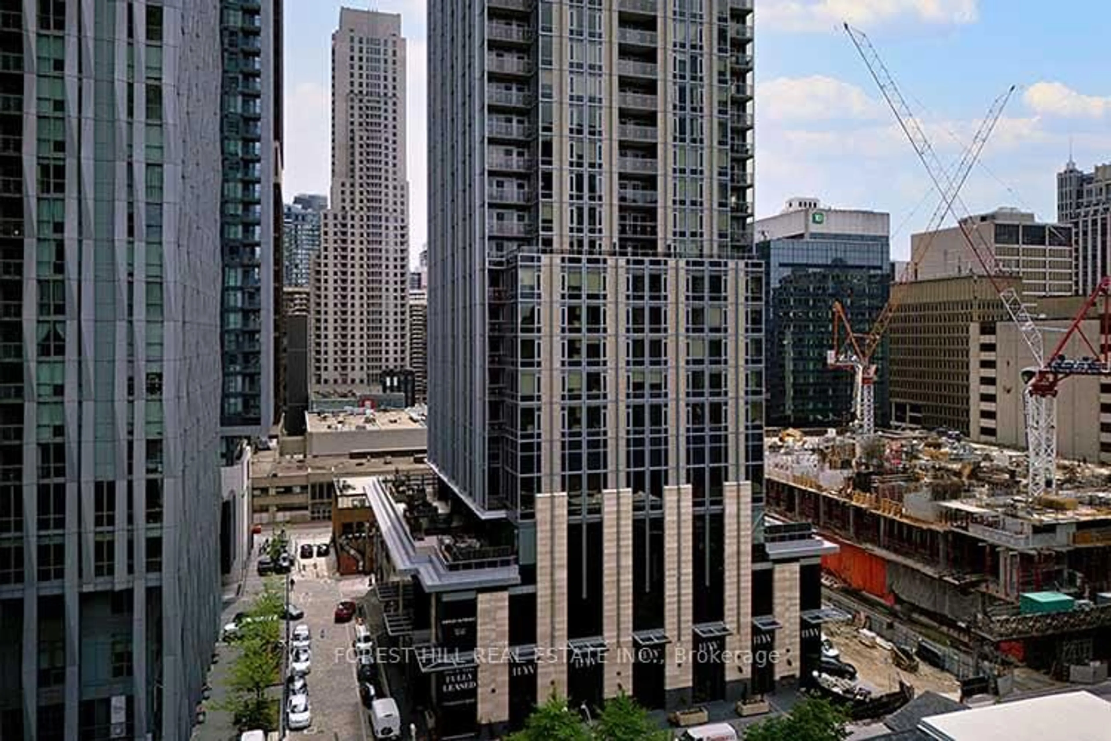Patio, city buildings view from balcony for 11 Yorkville Ave #1405, Toronto Ontario M5N 1L4