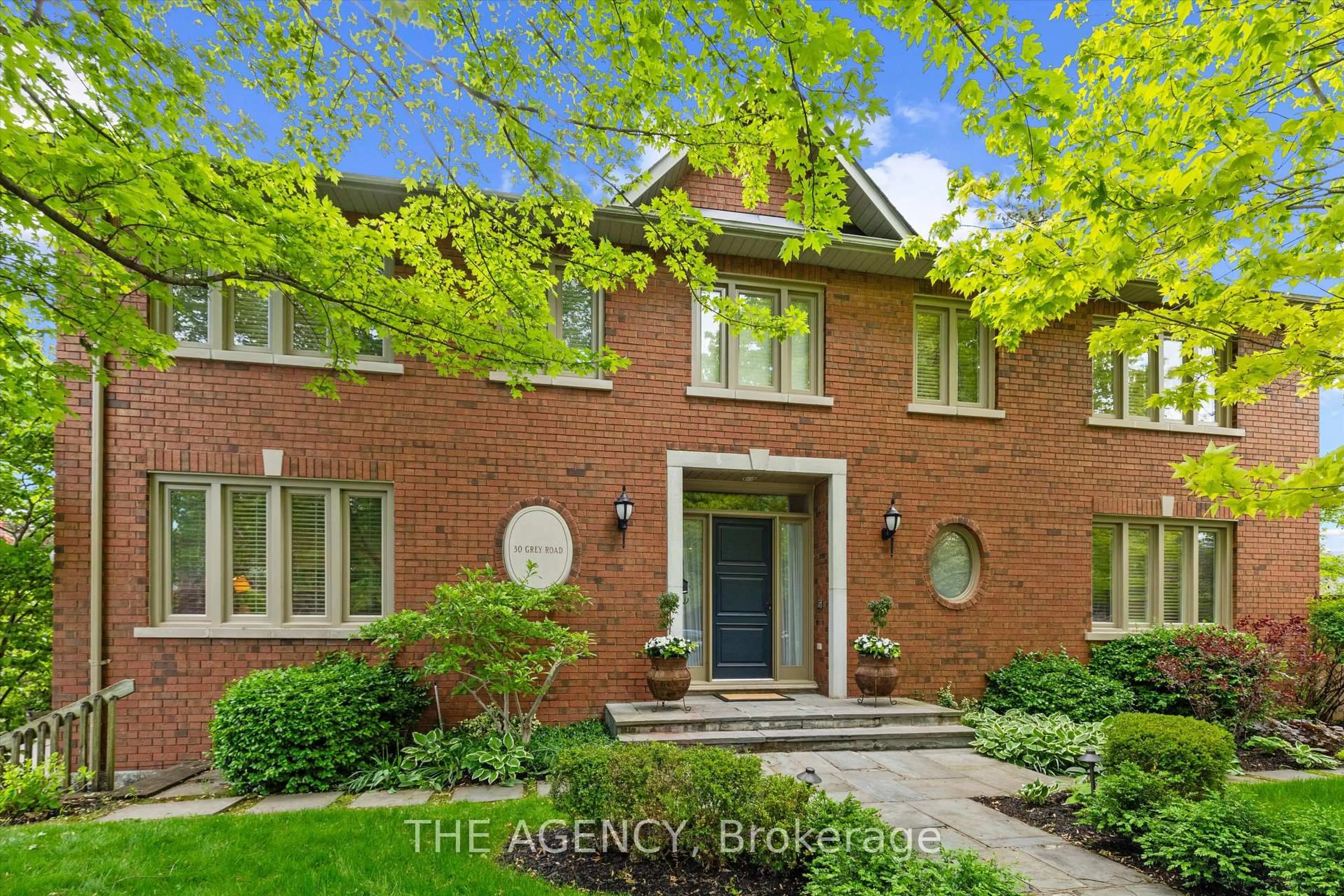 Home with brick exterior material, street for 30 Grey Rd, Toronto Ontario M5M 4E2