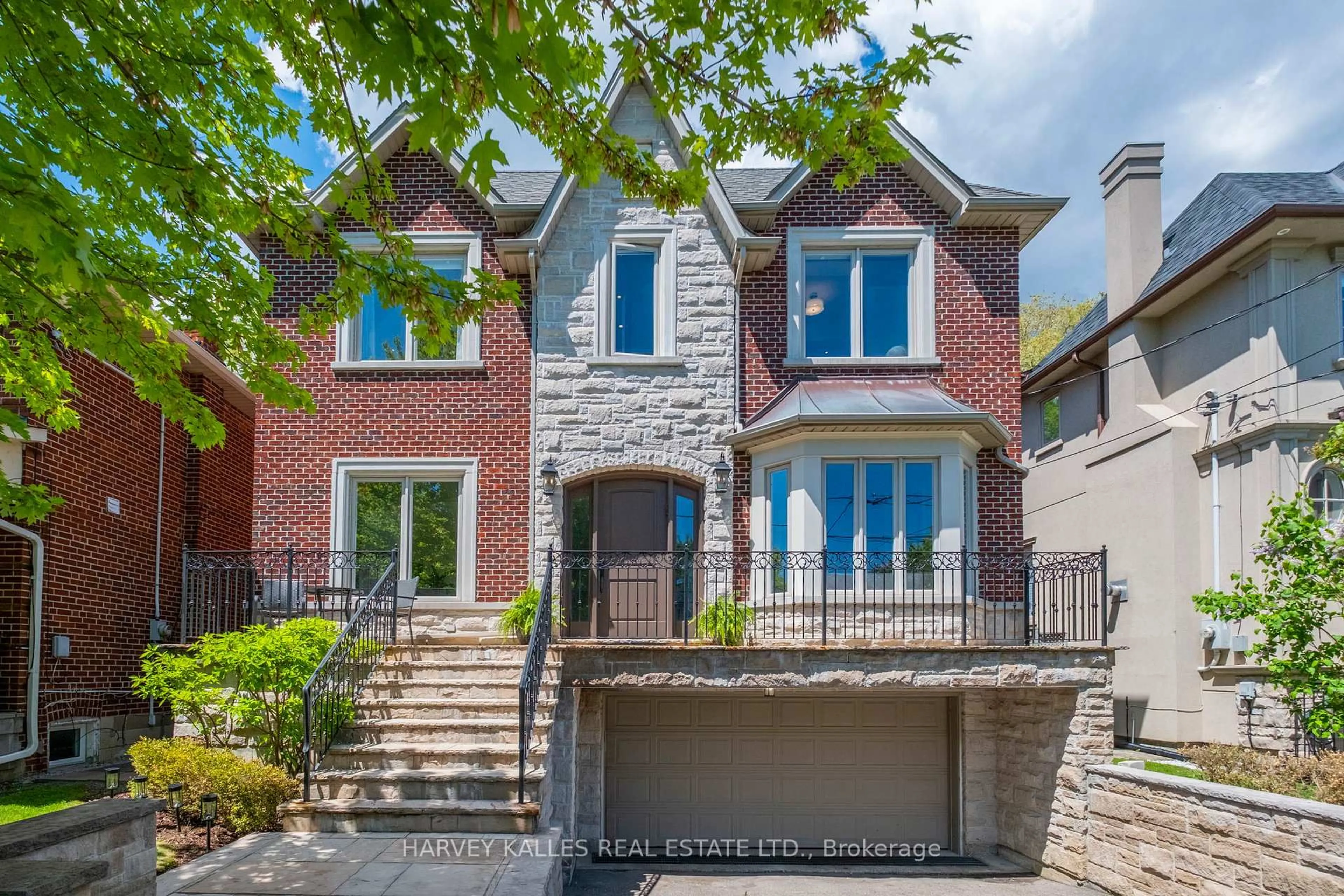 Home with brick exterior material, street for 568 Deloraine Ave, Toronto Ontario M5M 2C4
