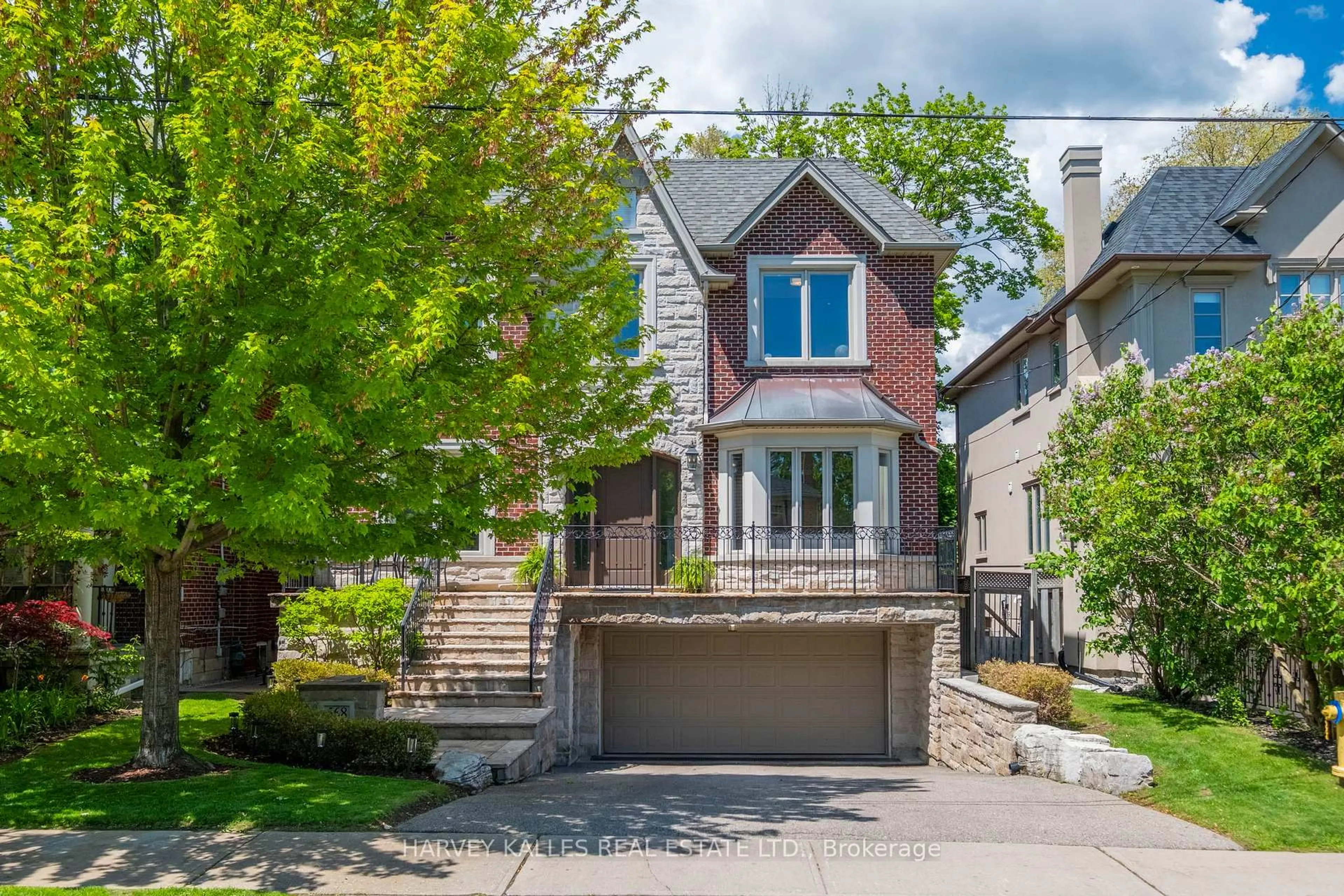 Home with brick exterior material, street for 568 Deloraine Ave, Toronto Ontario M5M 2C4