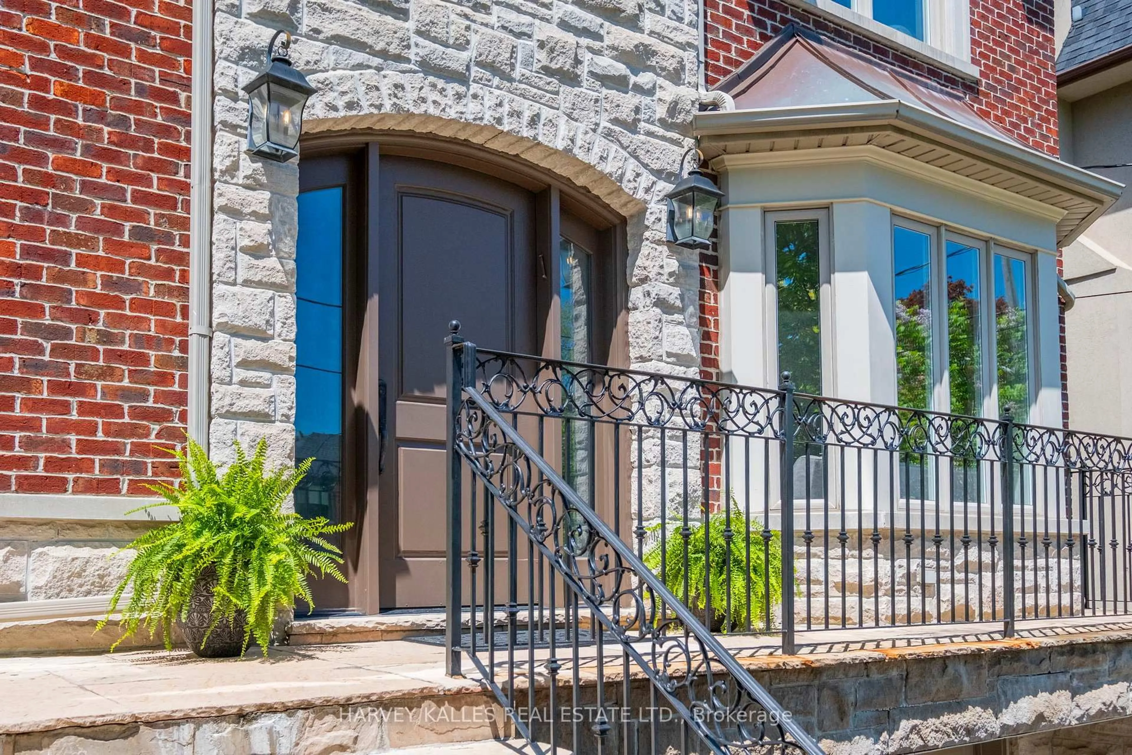 Home with brick exterior material, street for 568 Deloraine Ave, Toronto Ontario M5M 2C4