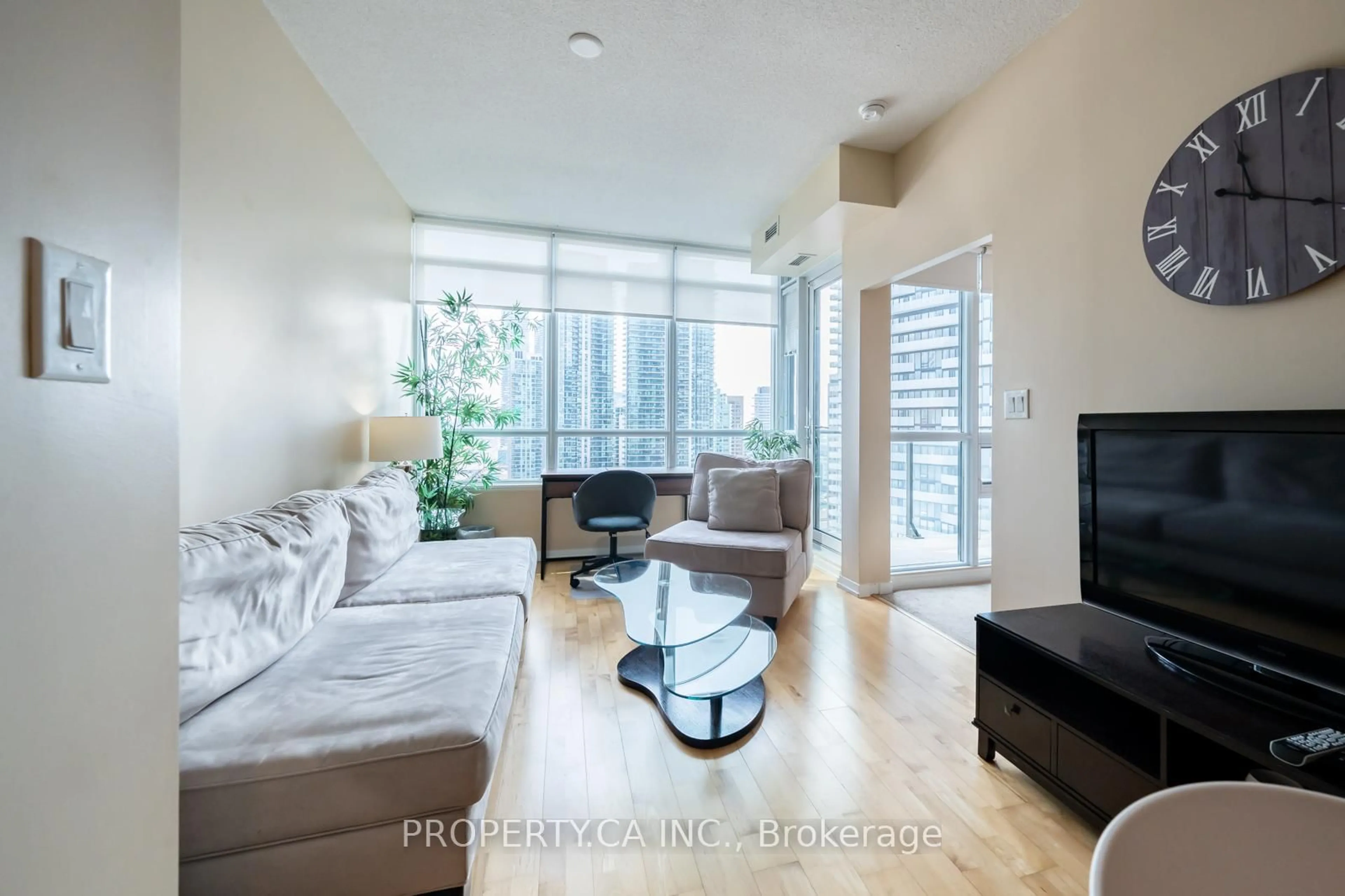 Living room with furniture, unknown for 55 Bremner Blvd #2205, Toronto Ontario M5J 0A6