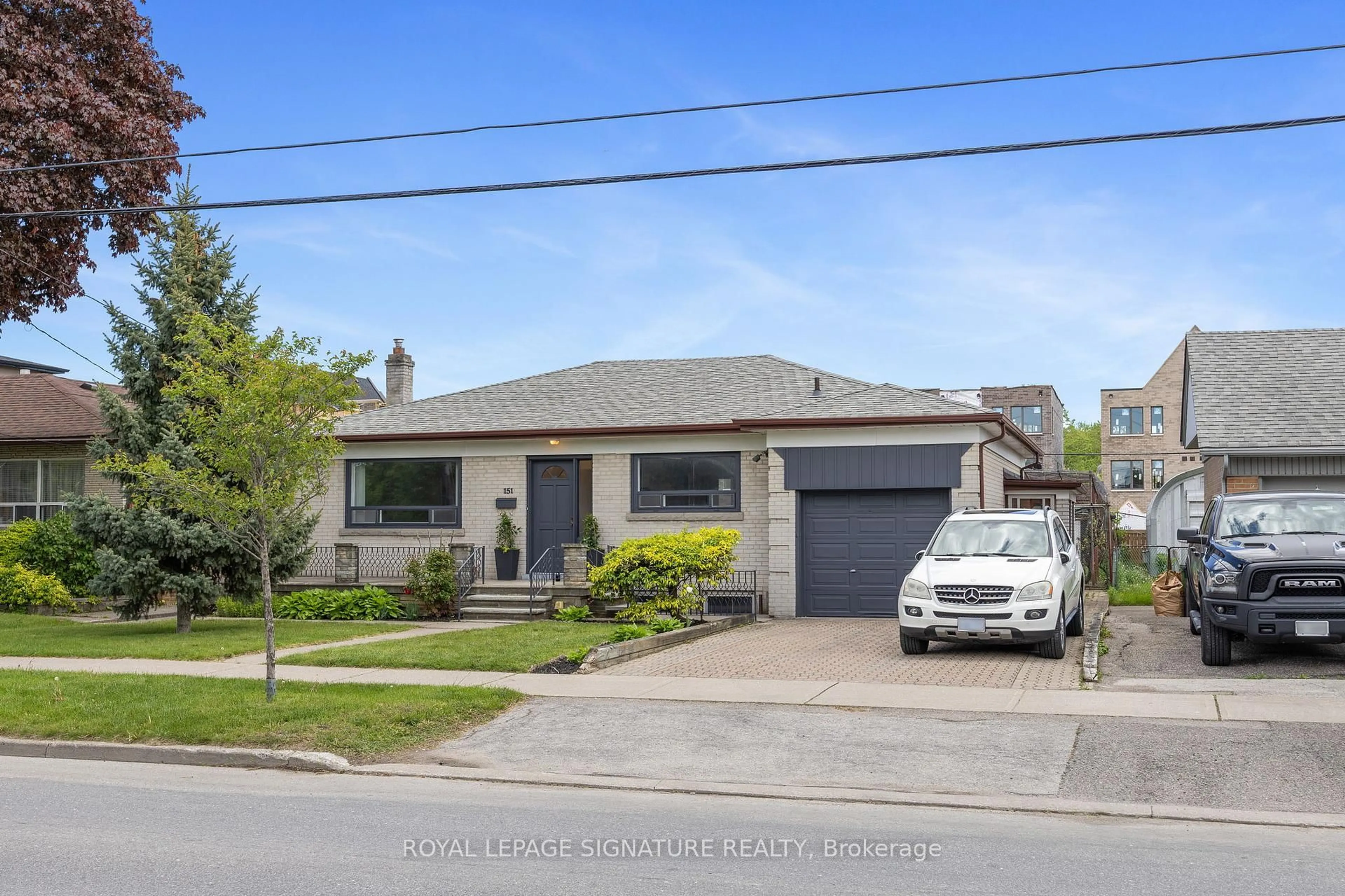 Home with brick exterior material, street for 151 Ranee Ave, Toronto Ontario M6A 1N3