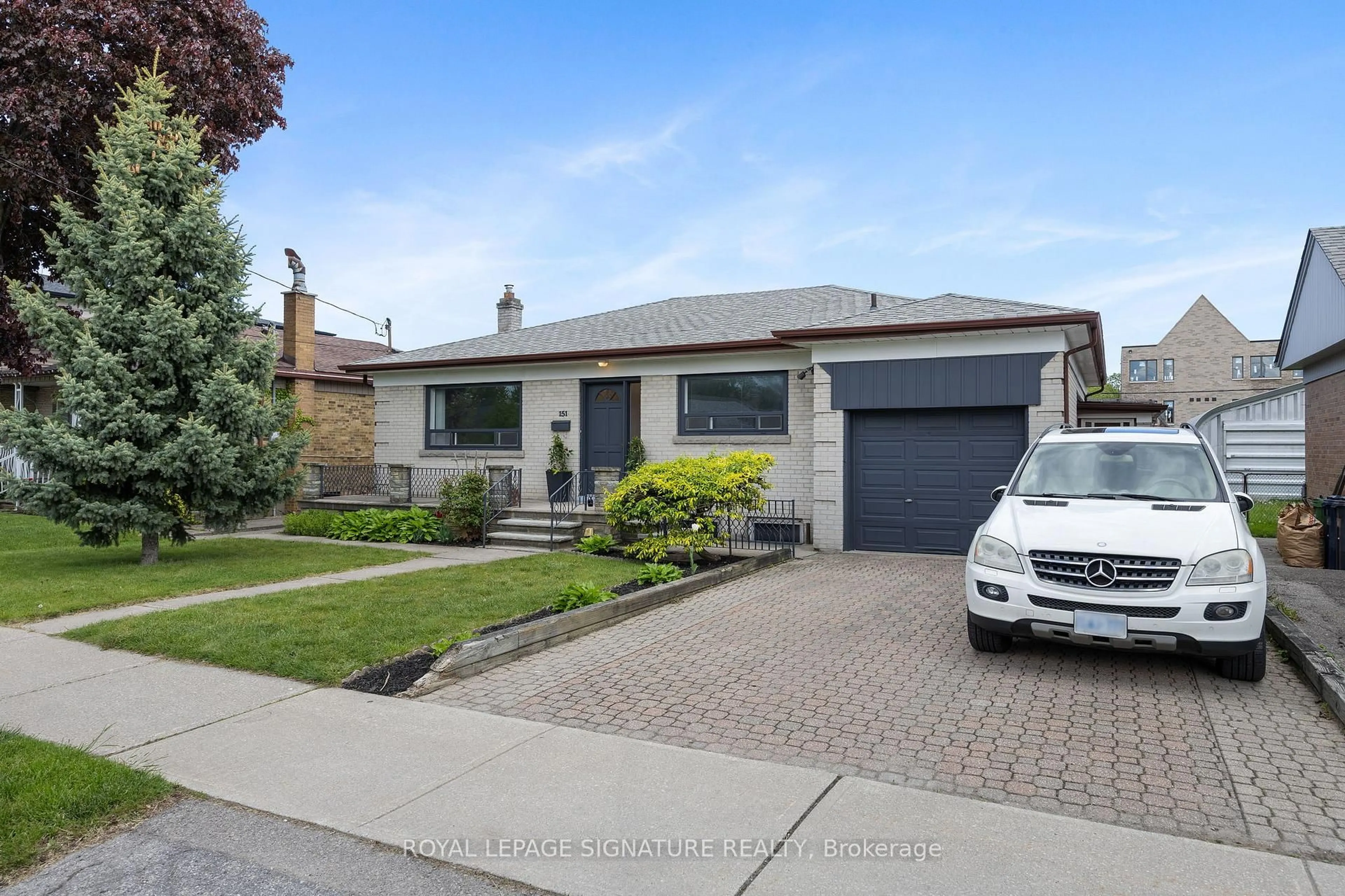 Home with brick exterior material, street for 151 Ranee Ave, Toronto Ontario M6A 1N3