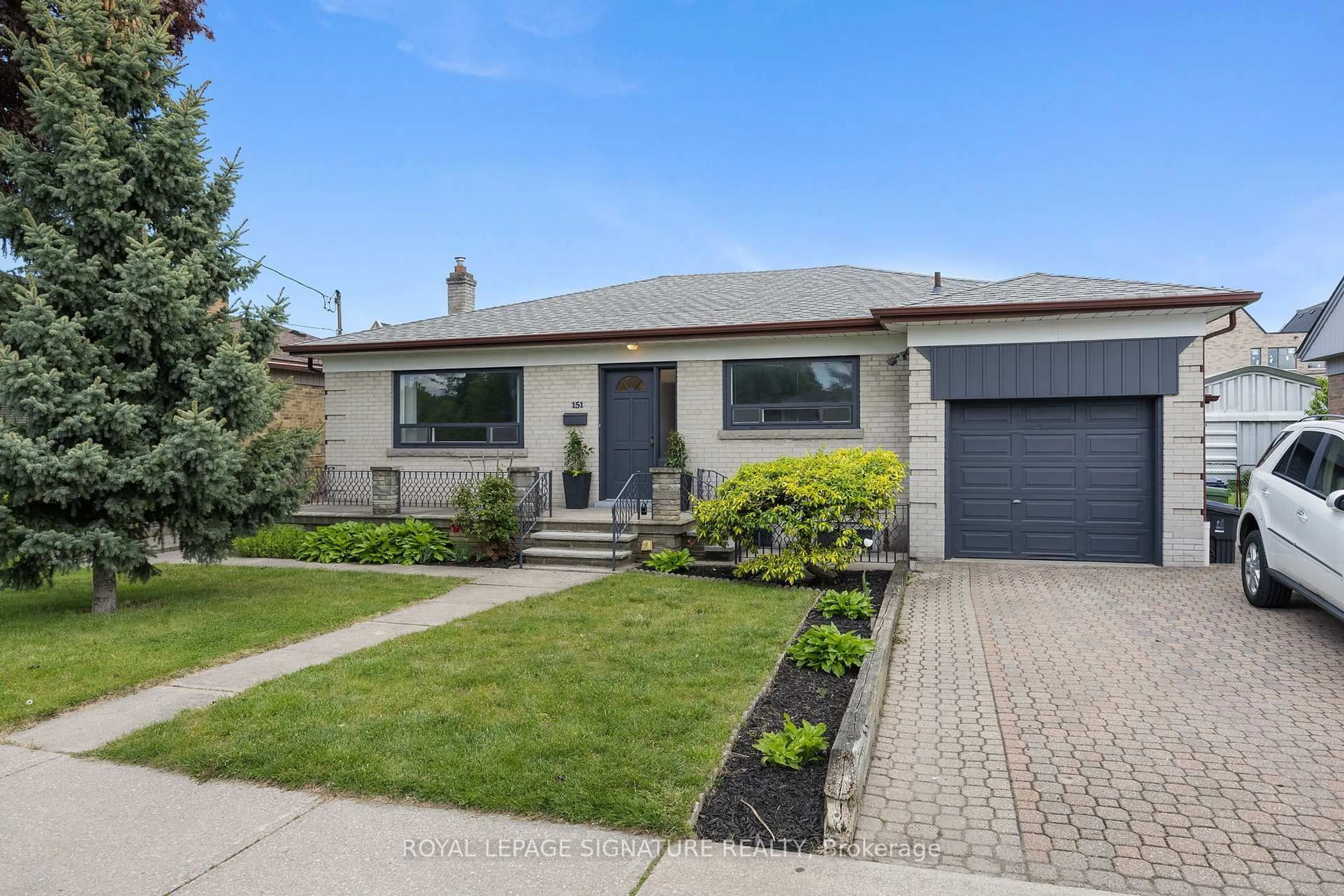 Home with brick exterior material, street for 151 Ranee Ave, Toronto Ontario M6A 1N3