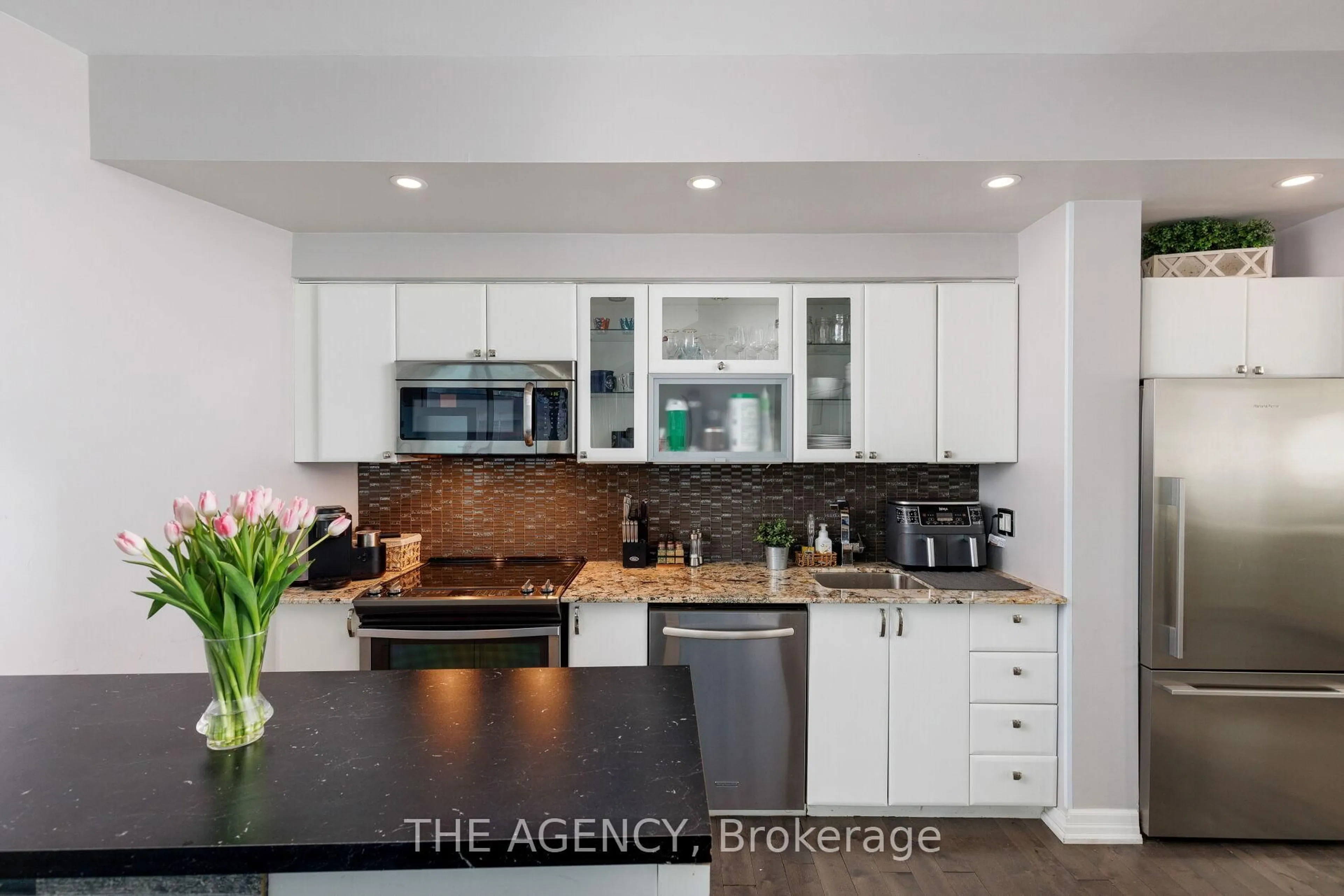 Open concept kitchen, ceramic/tile floor for 150 E Liberty St #413, Toronto Ontario M6K 3R5