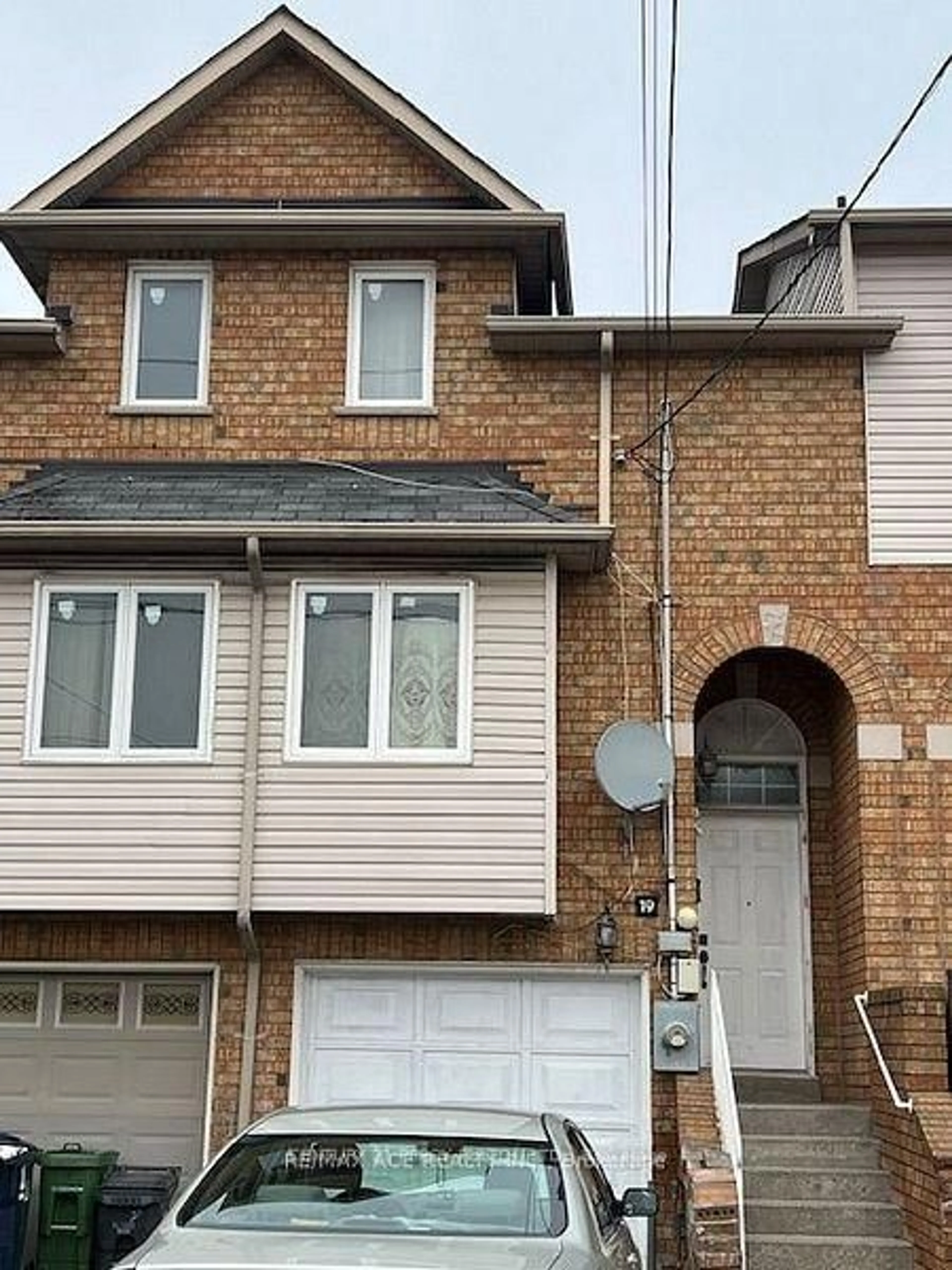 Home with brick exterior material, street for 19 Warner Ave Ave, Toronto Ontario M4A 2X1