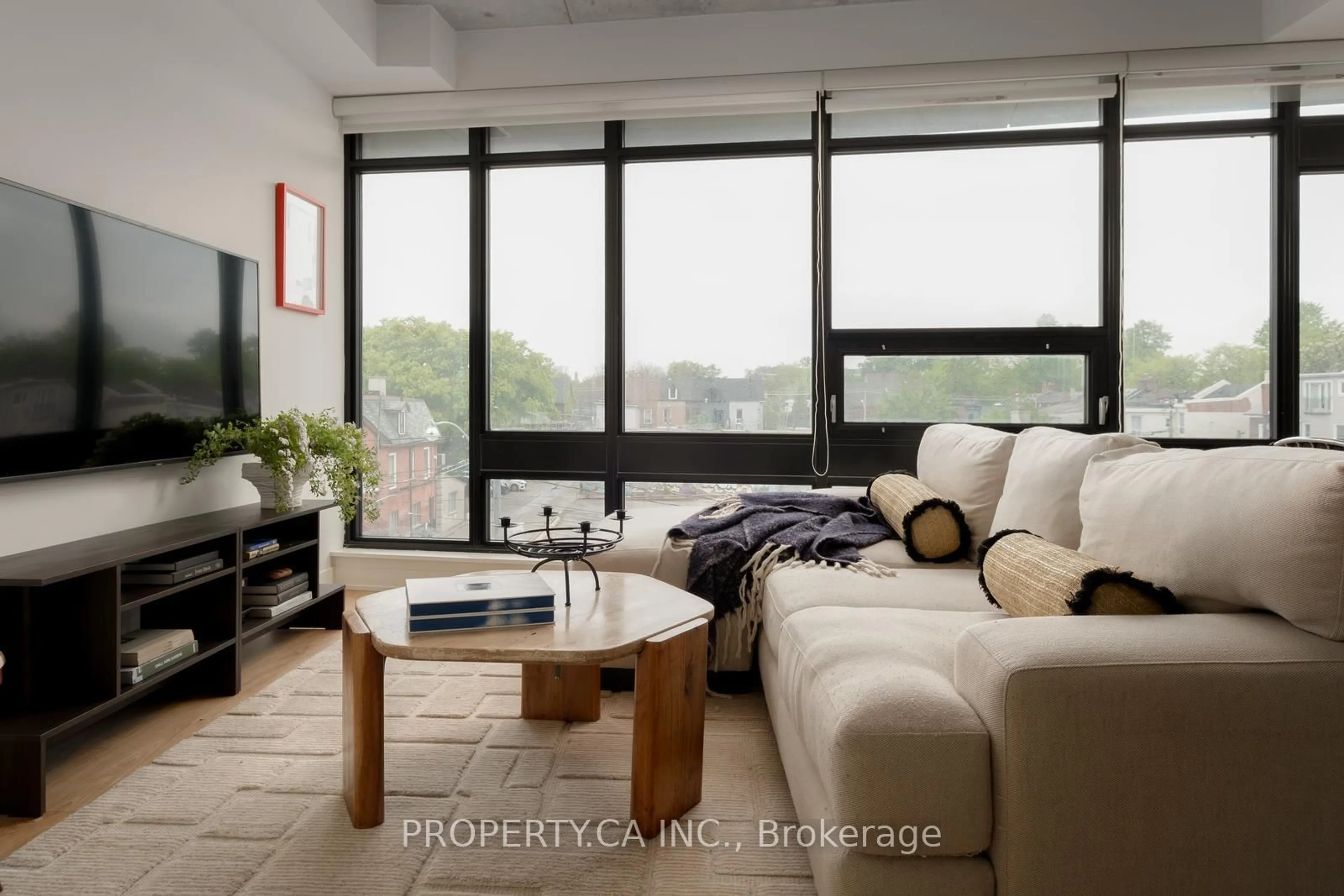 Living room with furniture, unknown for 1239 Dundas St #307, Toronto Ontario M6J 0E8