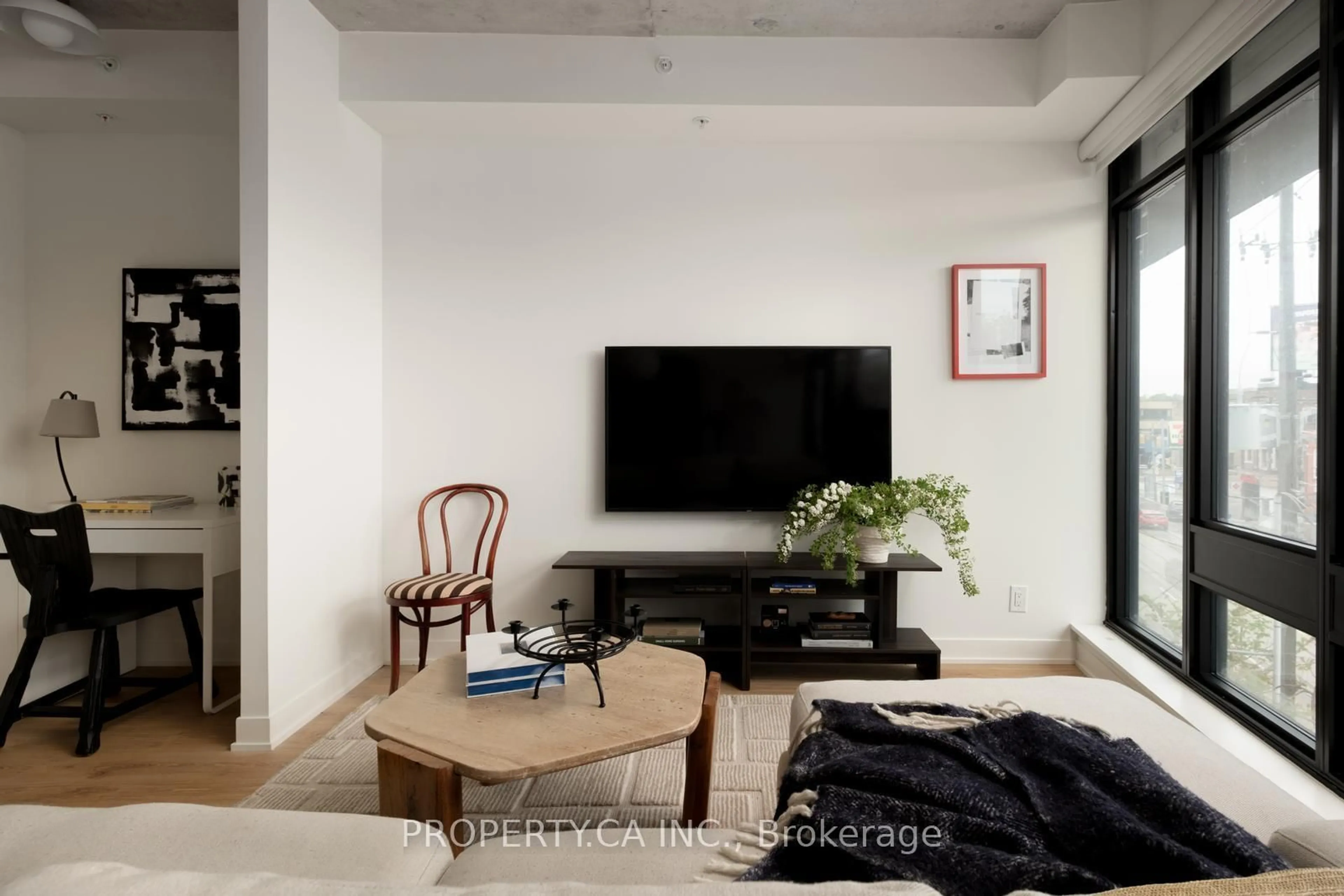 Living room with furniture, unknown for 1239 Dundas St #307, Toronto Ontario M6J 0E8