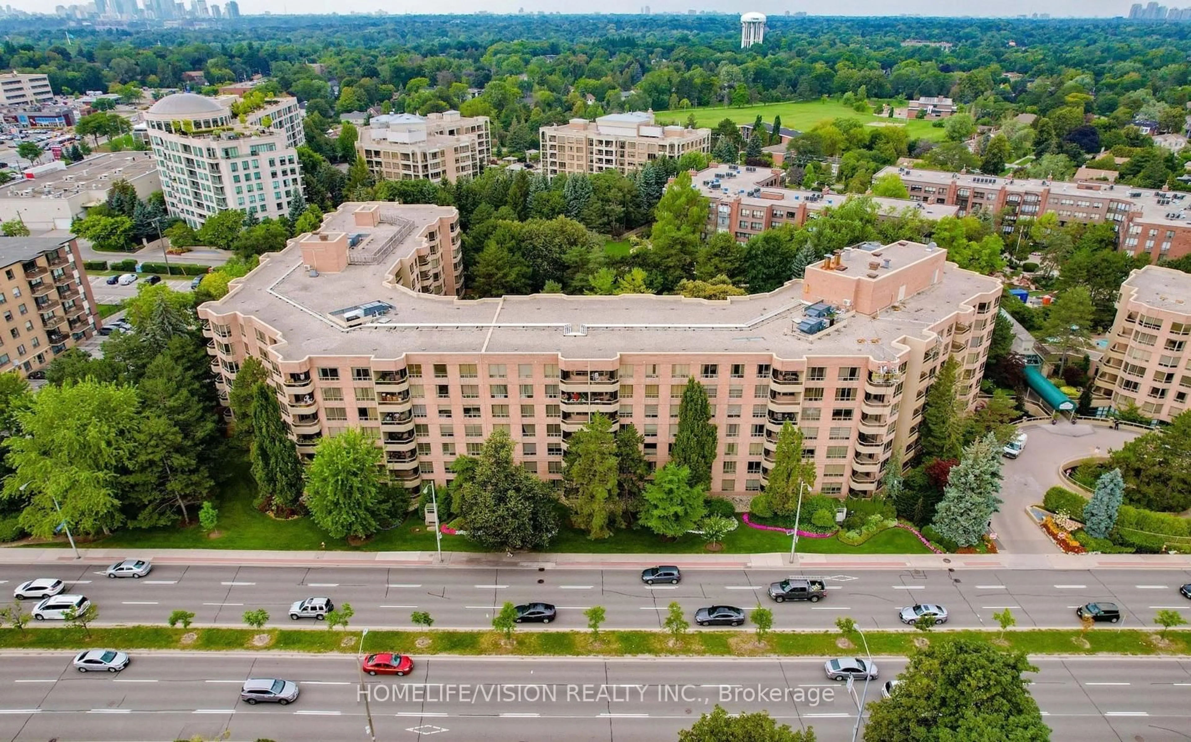 A pic from outside/outdoor area/front of a property/back of a property/a pic from drone, city buildings view from balcony for 1200 Don Mills Rd #101, Toronto Ontario M3B 3N8