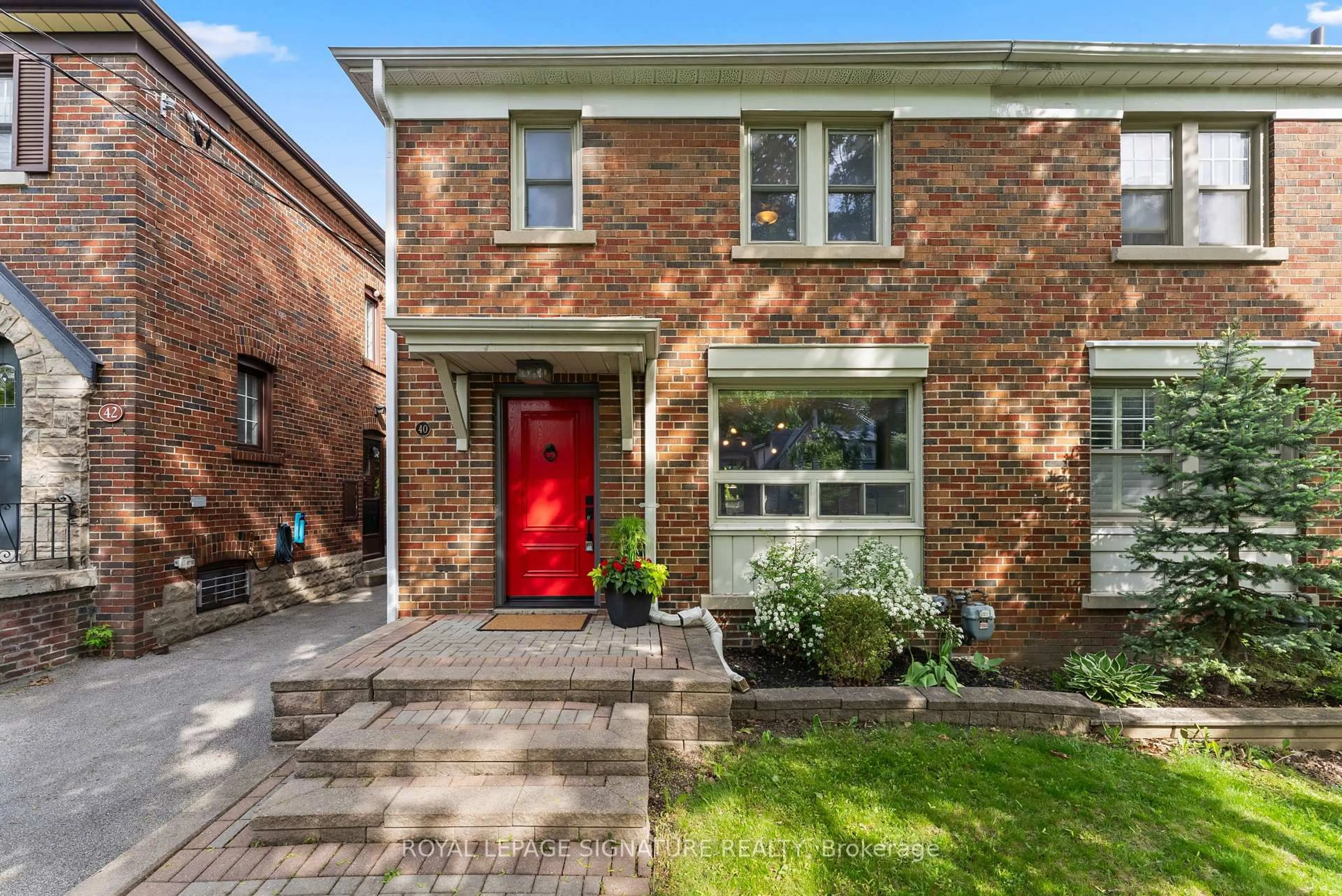 Home with brick exterior material, street for 40 Southvale Dr, Toronto Ontario M4G 1G3