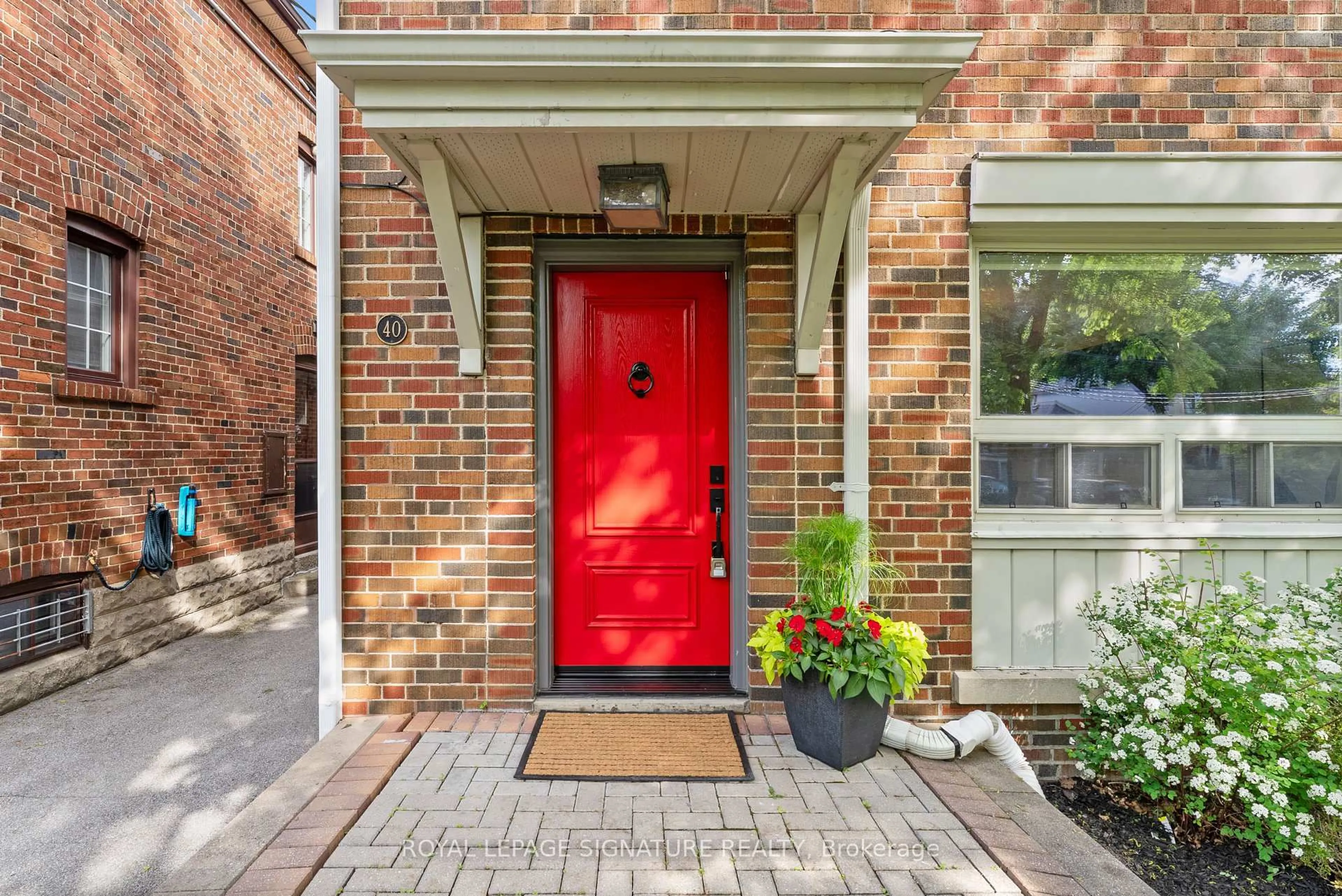 Home with brick exterior material, street for 40 Southvale Dr, Toronto Ontario M4G 1G3