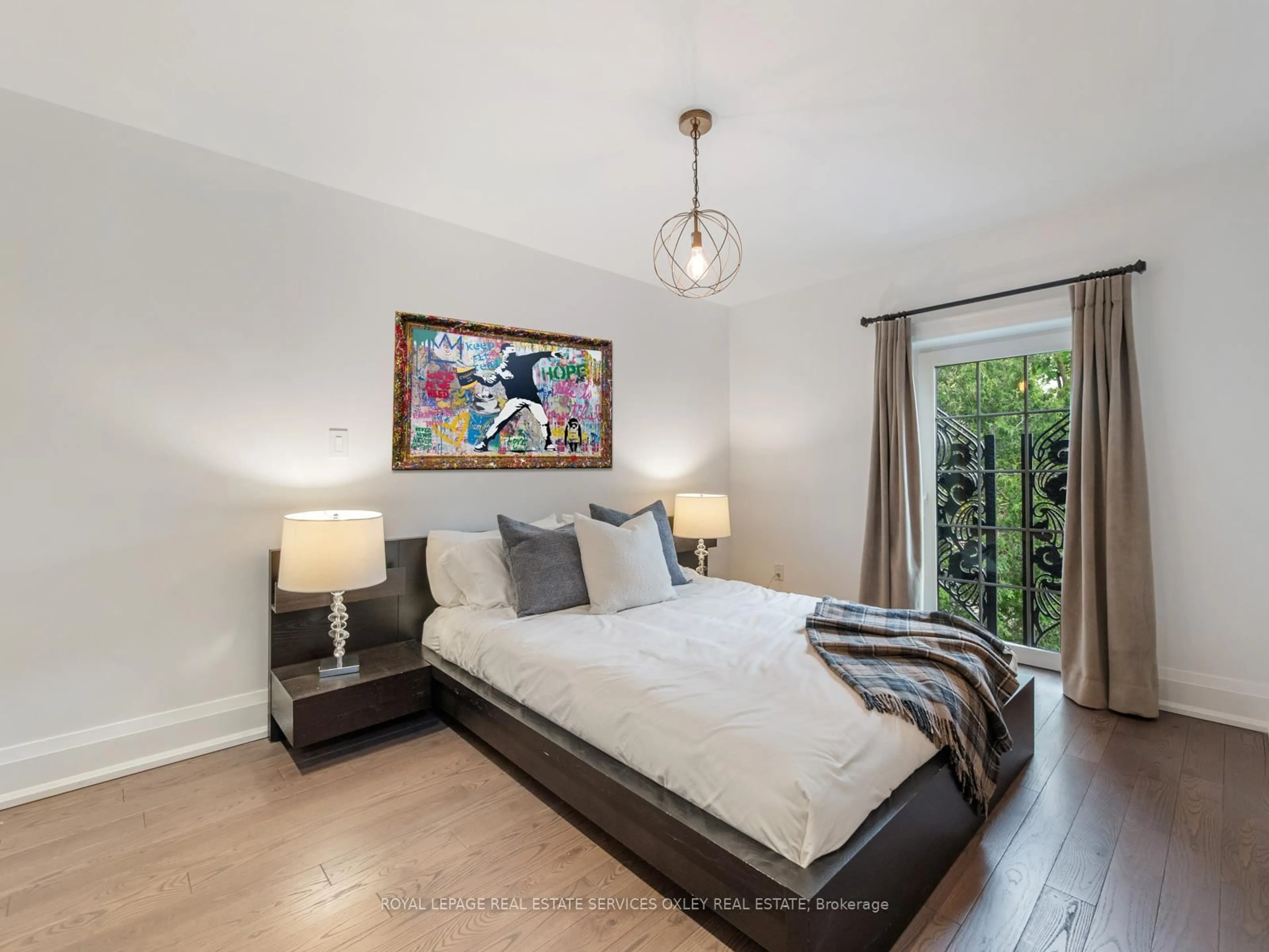 Bedroom with bed, wood/laminate floor for 7 Poplar Plains Rd, Toronto Ontario M4V 2M7