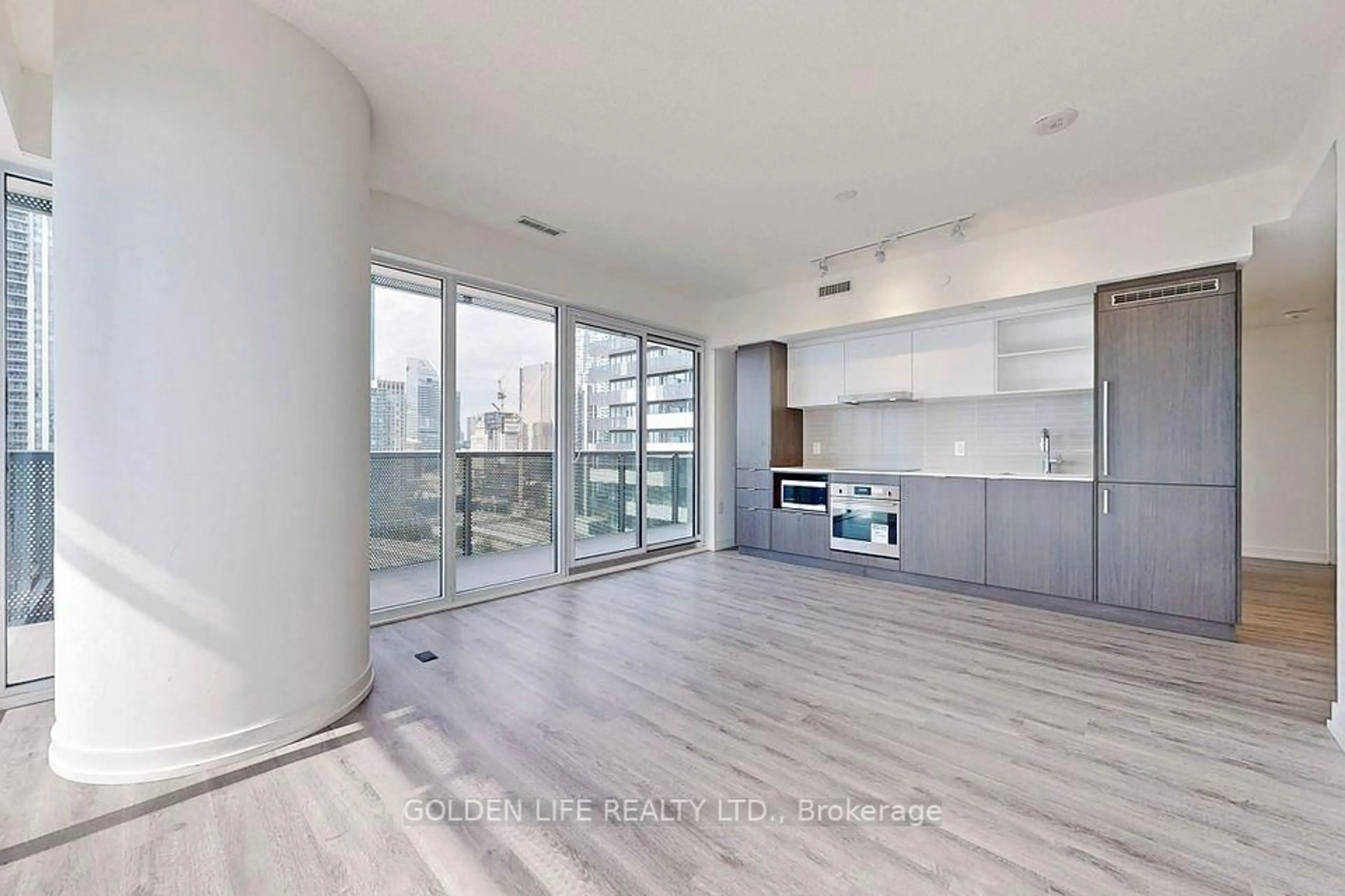 Open concept kitchen, wood/laminate floor for 138 Downes St #2511, Toronto Ontario M5E 0E4