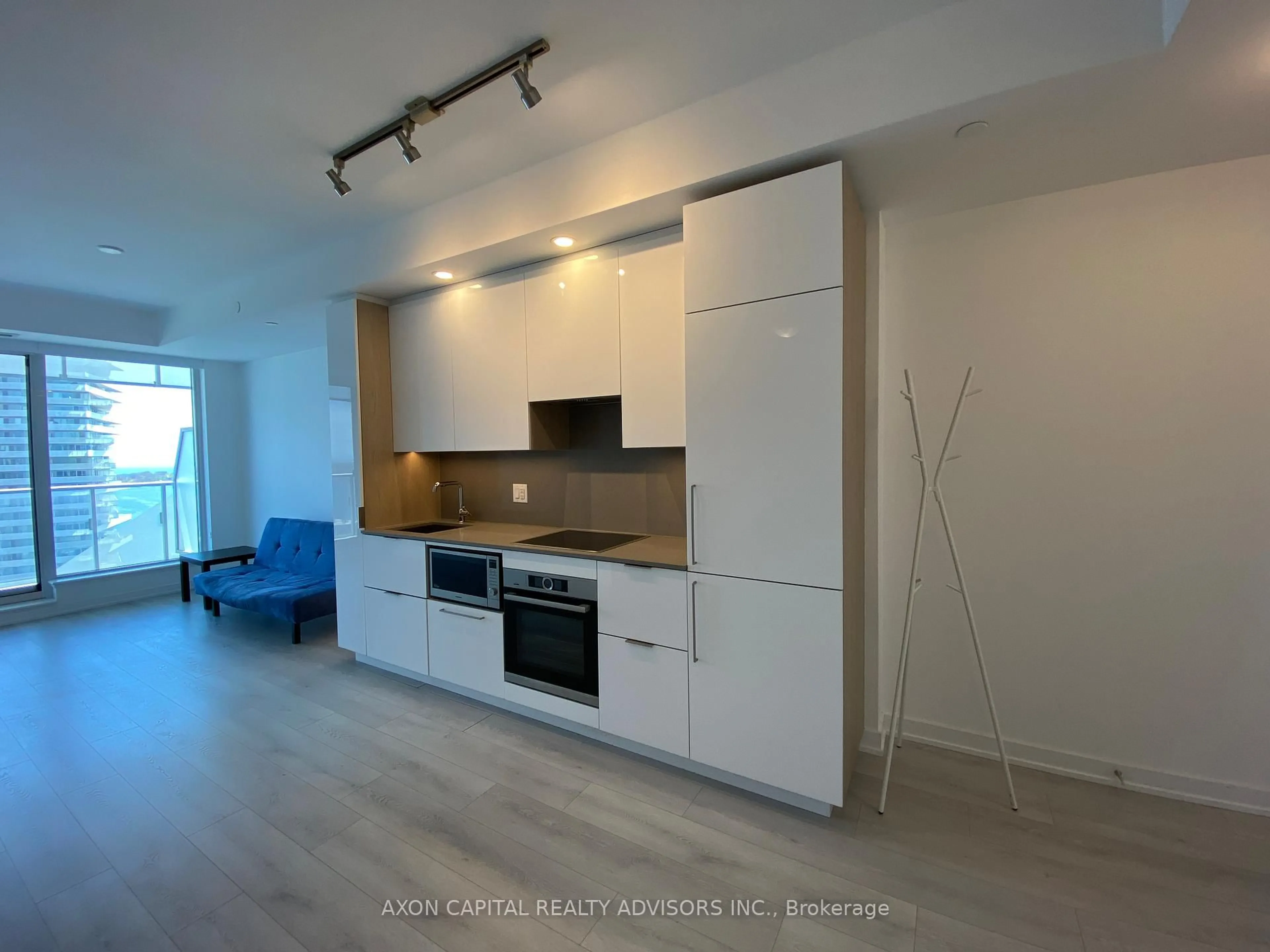 Open concept kitchen, wood/laminate floor for 28 Freeland St #2501, Toronto Ontario M5E 0E3
