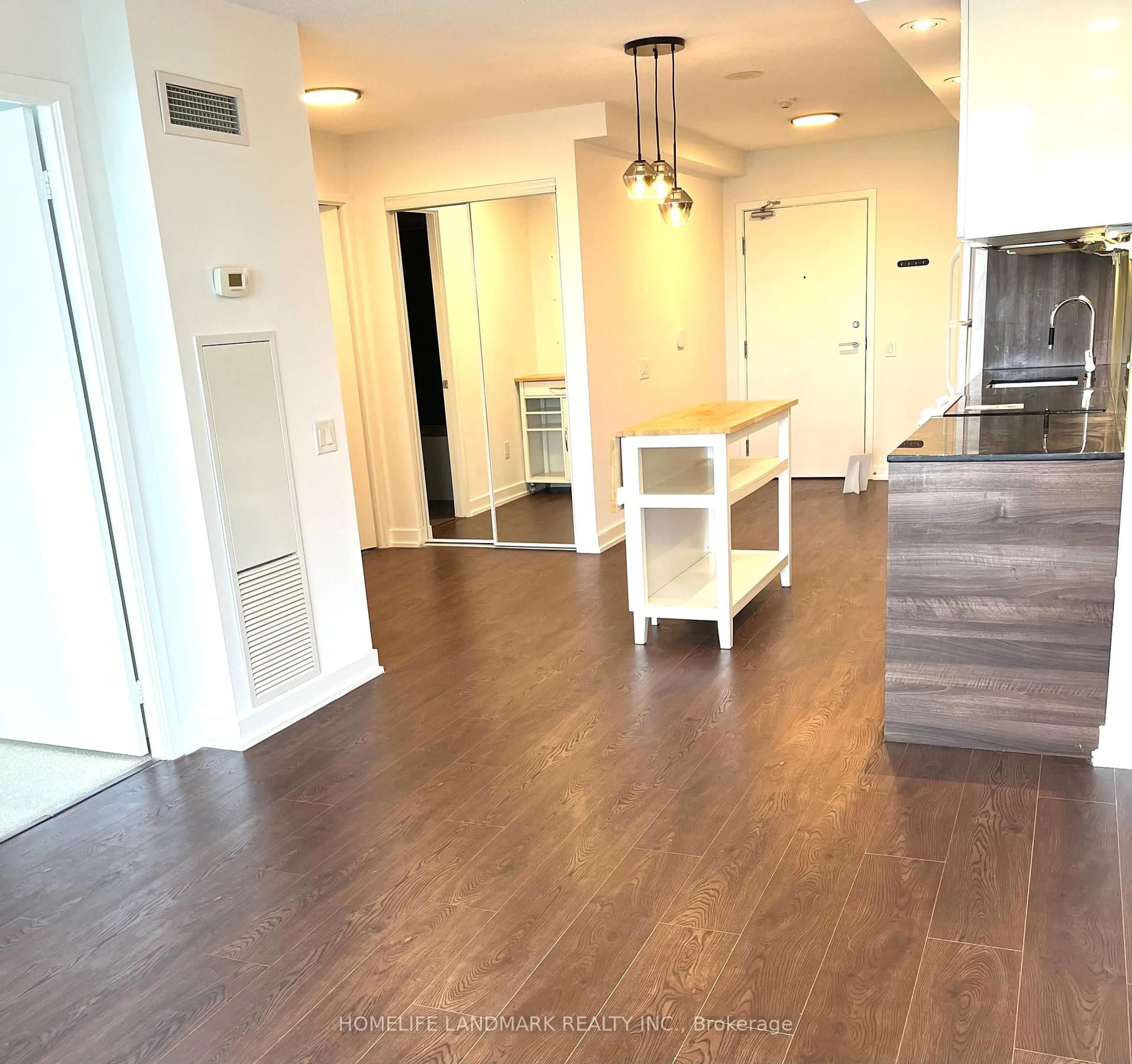 Open concept kitchen, wood/laminate floor for 121 Mcmahon Dr #907, Toronto Ontario M2K 0C1