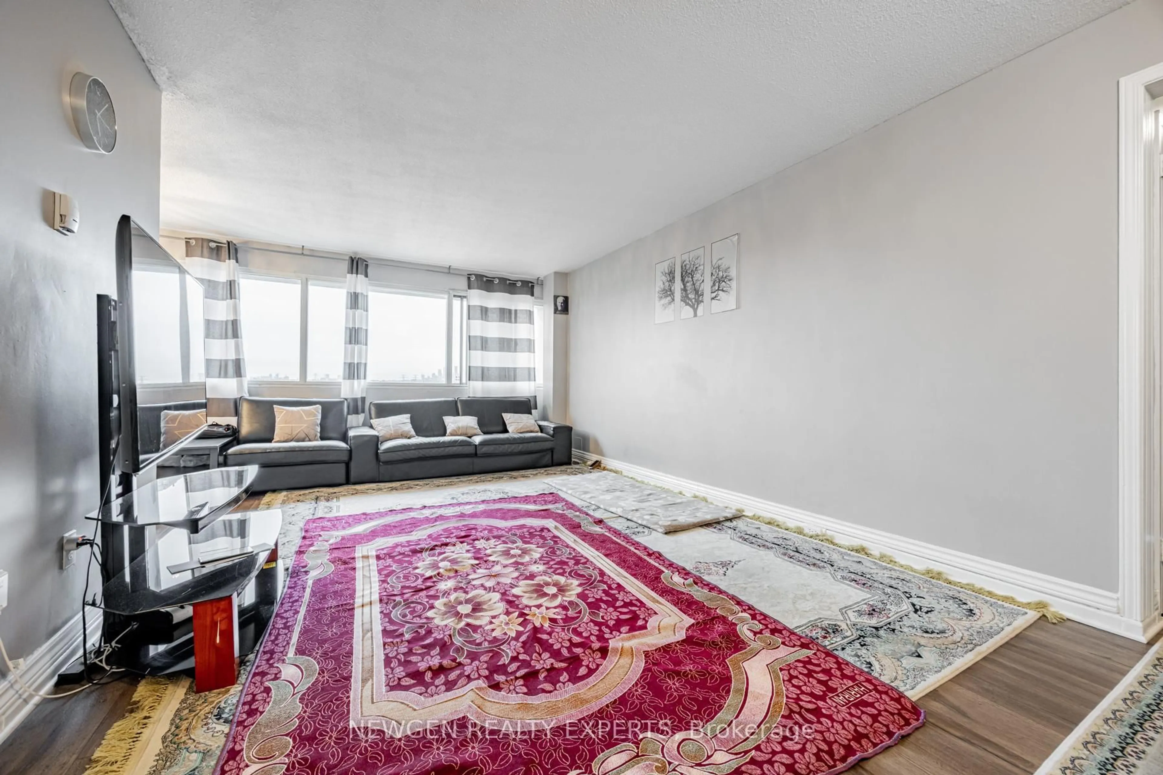Living room with furniture, carpet floor for 715 Don Mills Rd #802, Toronto Ontario M3C 1S5