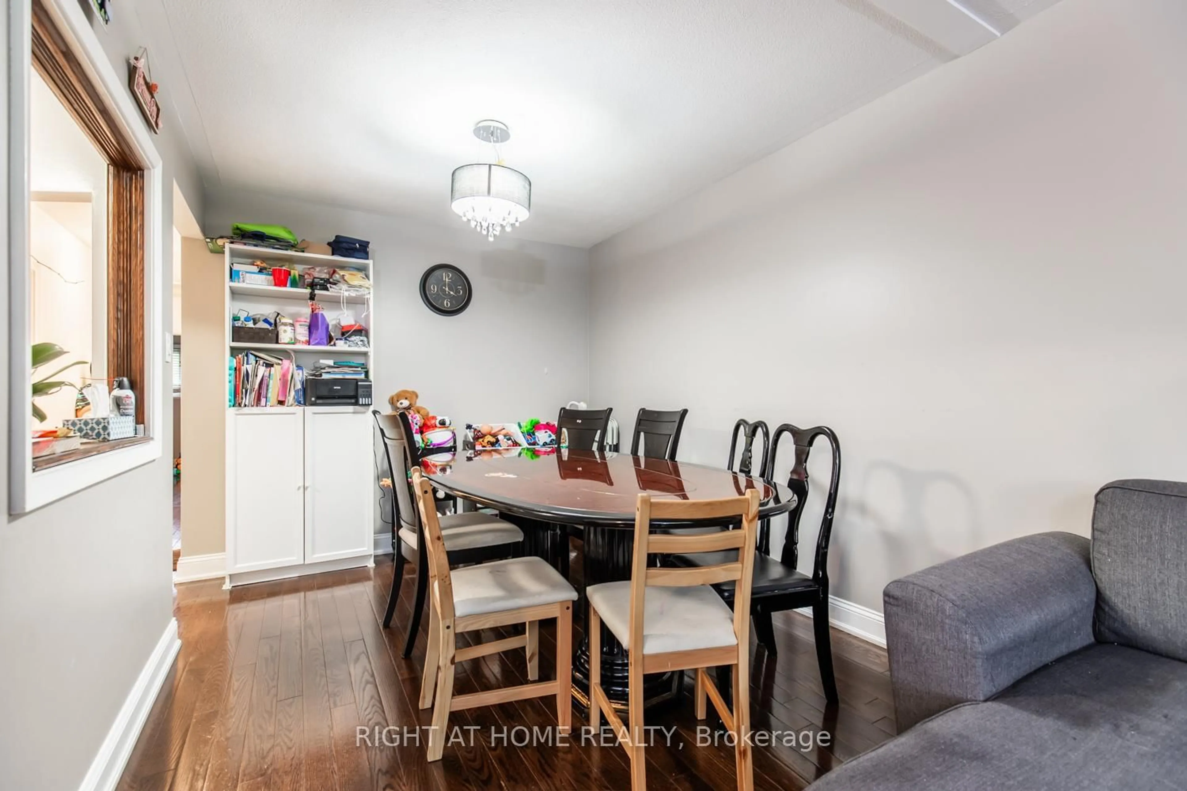 Dining room, wood/laminate floor for 12 Murellen Cres, Toronto Ontario M4A 2K5