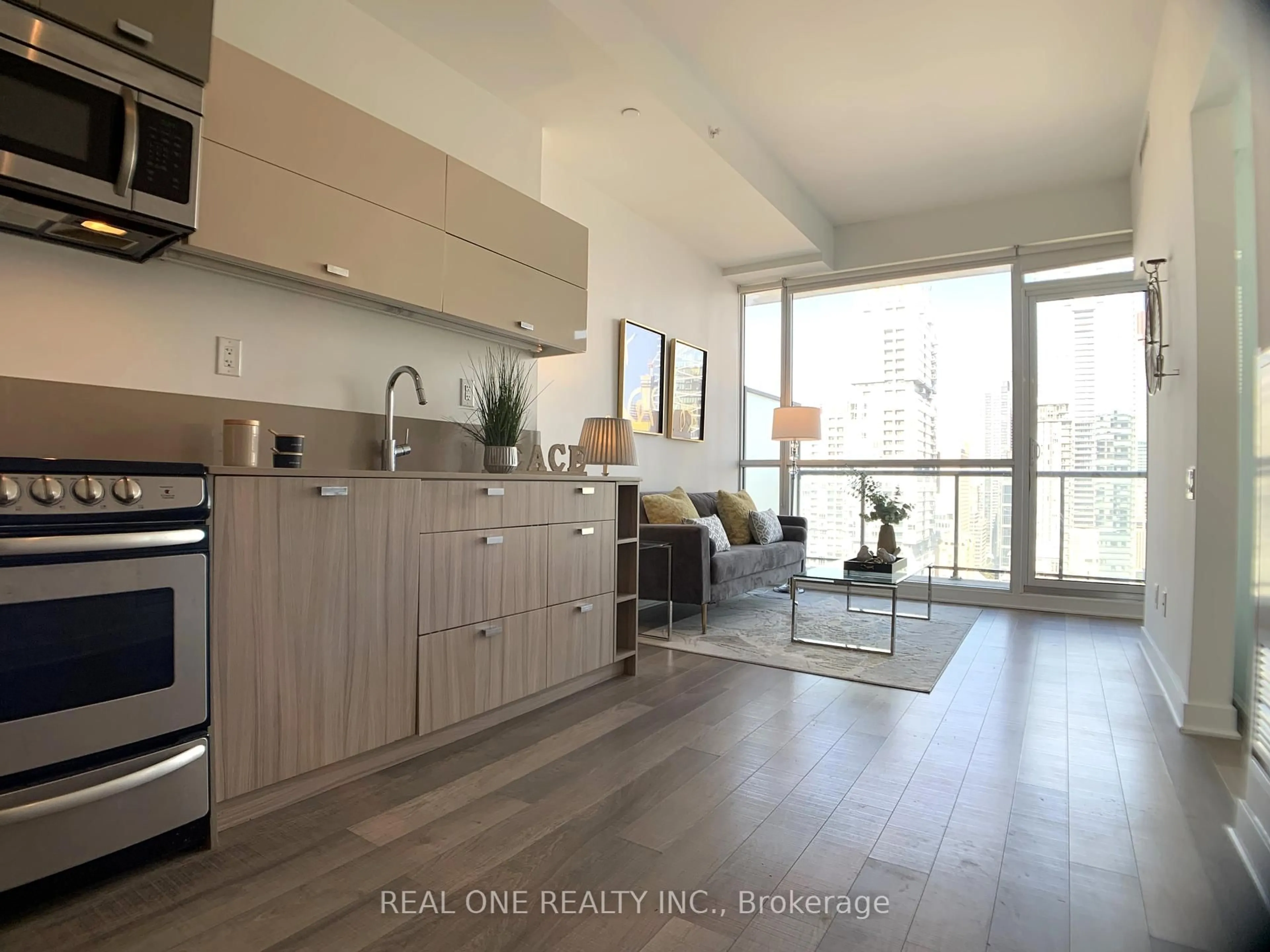 Open concept kitchen, wood/laminate floor for 290 Adelaide St #2306, Toronto Ontario M5V 1P6
