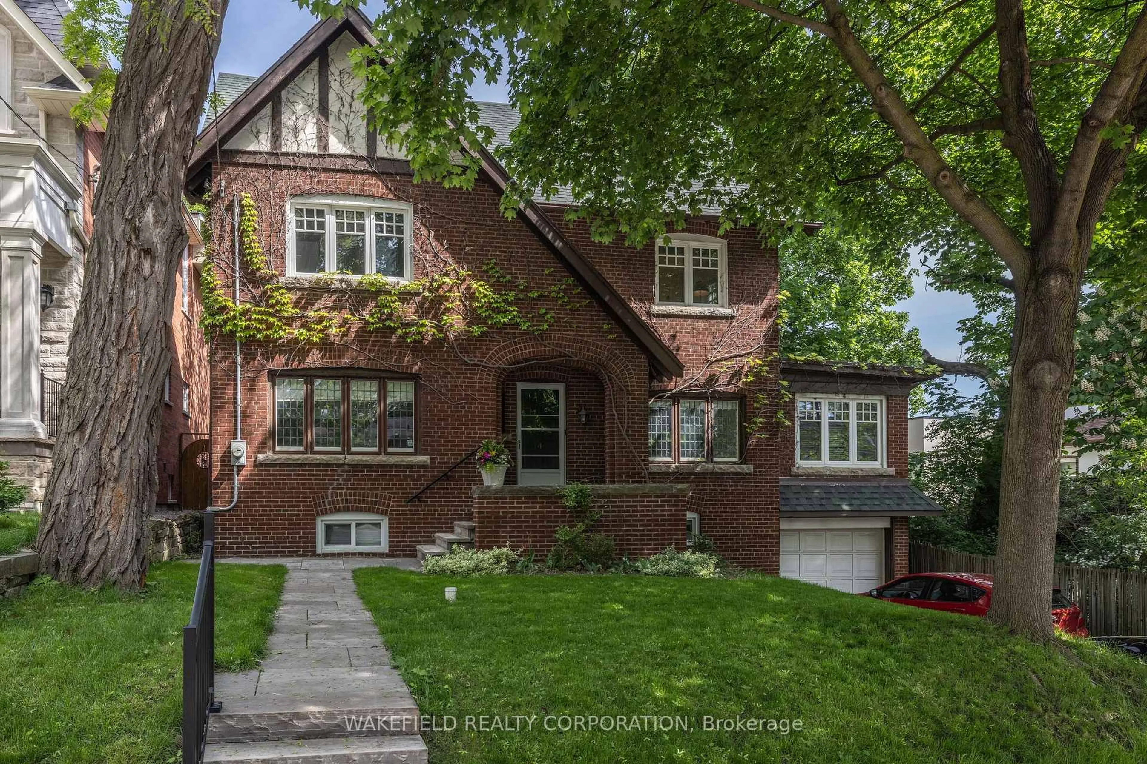 Home with brick exterior material, street for 14 Willowbank Blvd, Toronto Ontario M4R 1B6