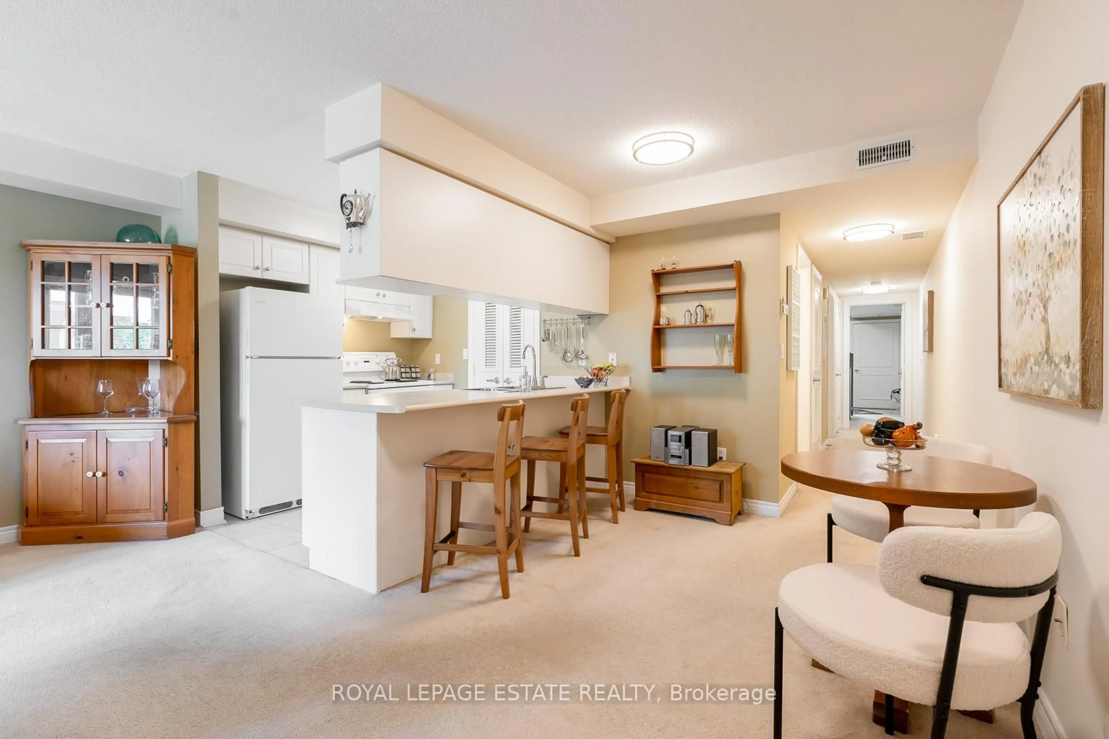 Open concept kitchen, ceramic/tile floor for 76 Aerodrome Cres #201, Toronto Ontario M4G 4J1