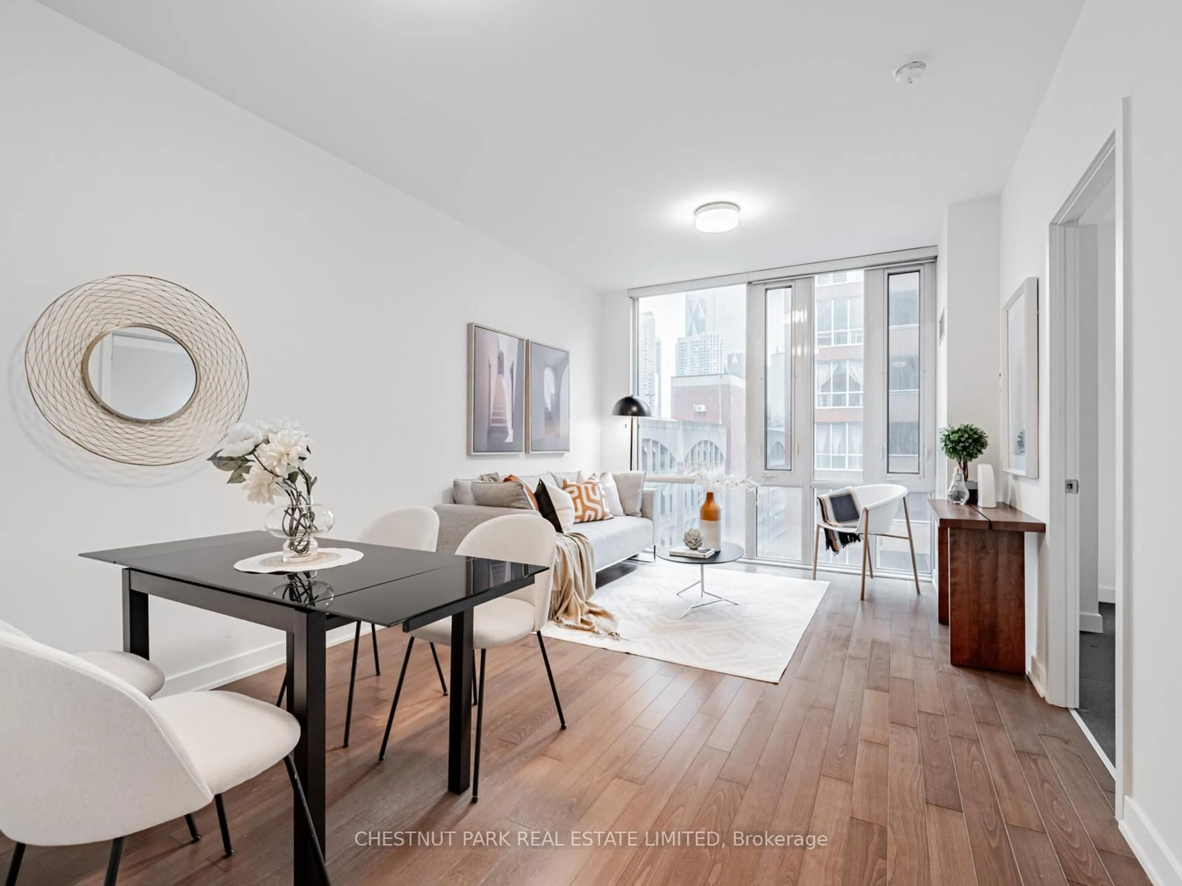 Living room with furniture, wood/laminate floor for 3 Market St #421, Toronto Ontario M5E 0A3