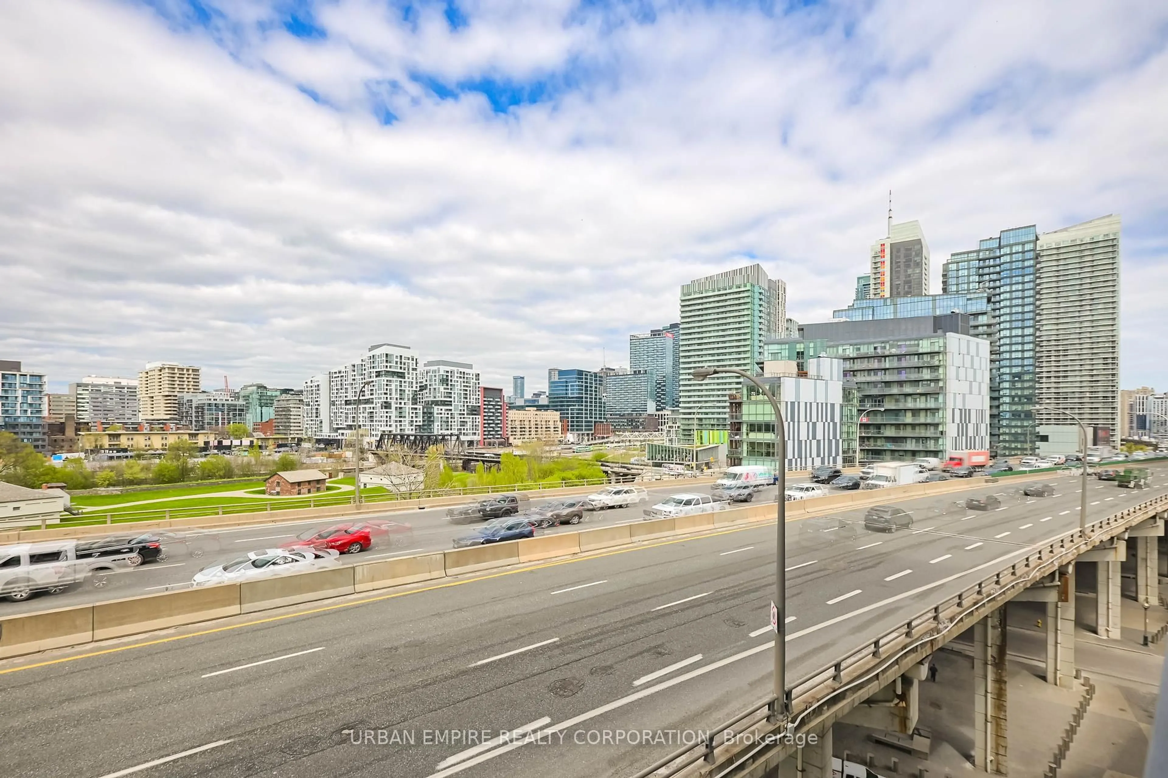 A pic from outside/outdoor area/front of a property/back of a property/a pic from drone, city buildings view from balcony for 50 Bruyeres Mews #913, Toronto Ontario M5V 0H8