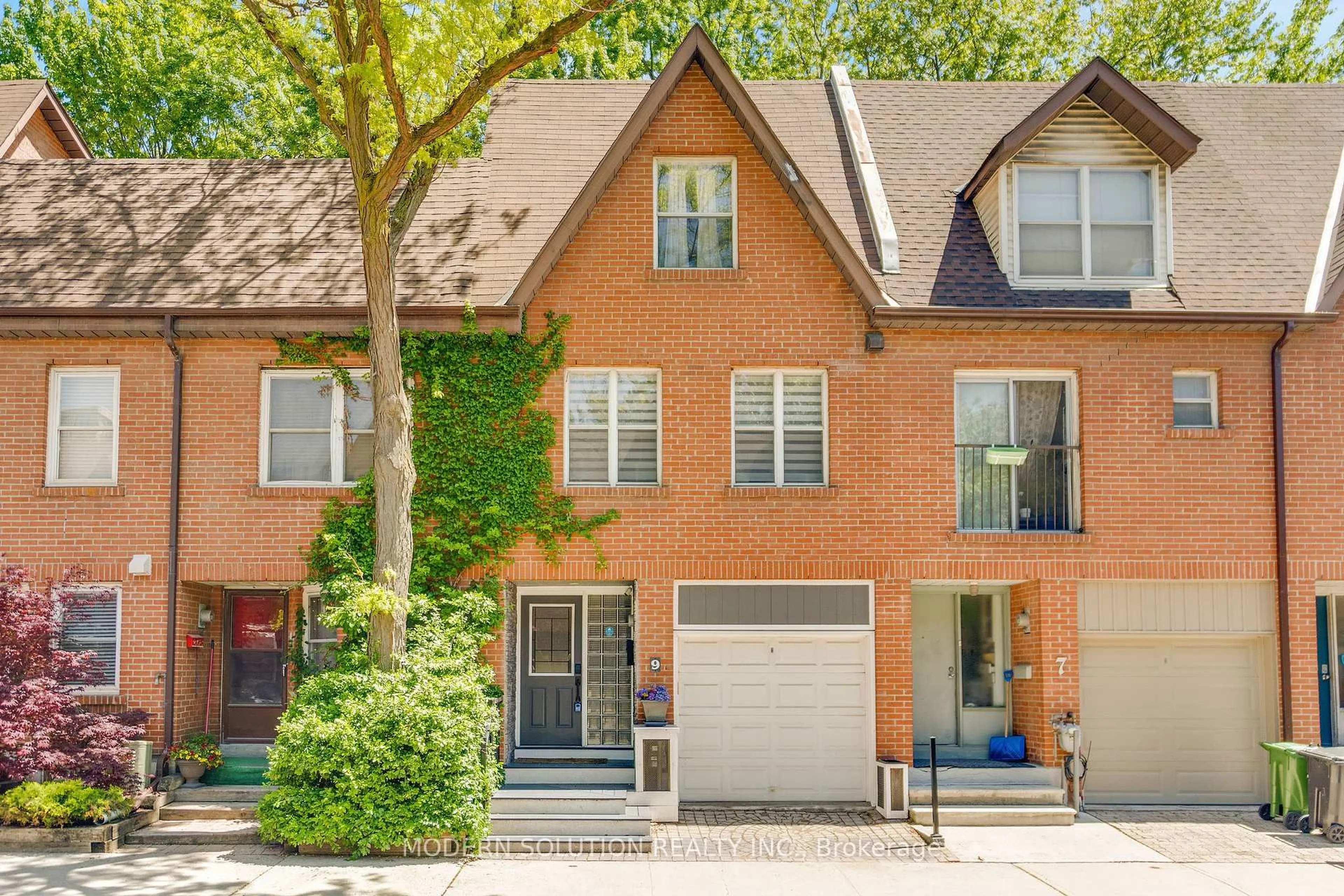 Home with brick exterior material, street for 9 Douville Crt, Toronto Ontario M5A 4E7