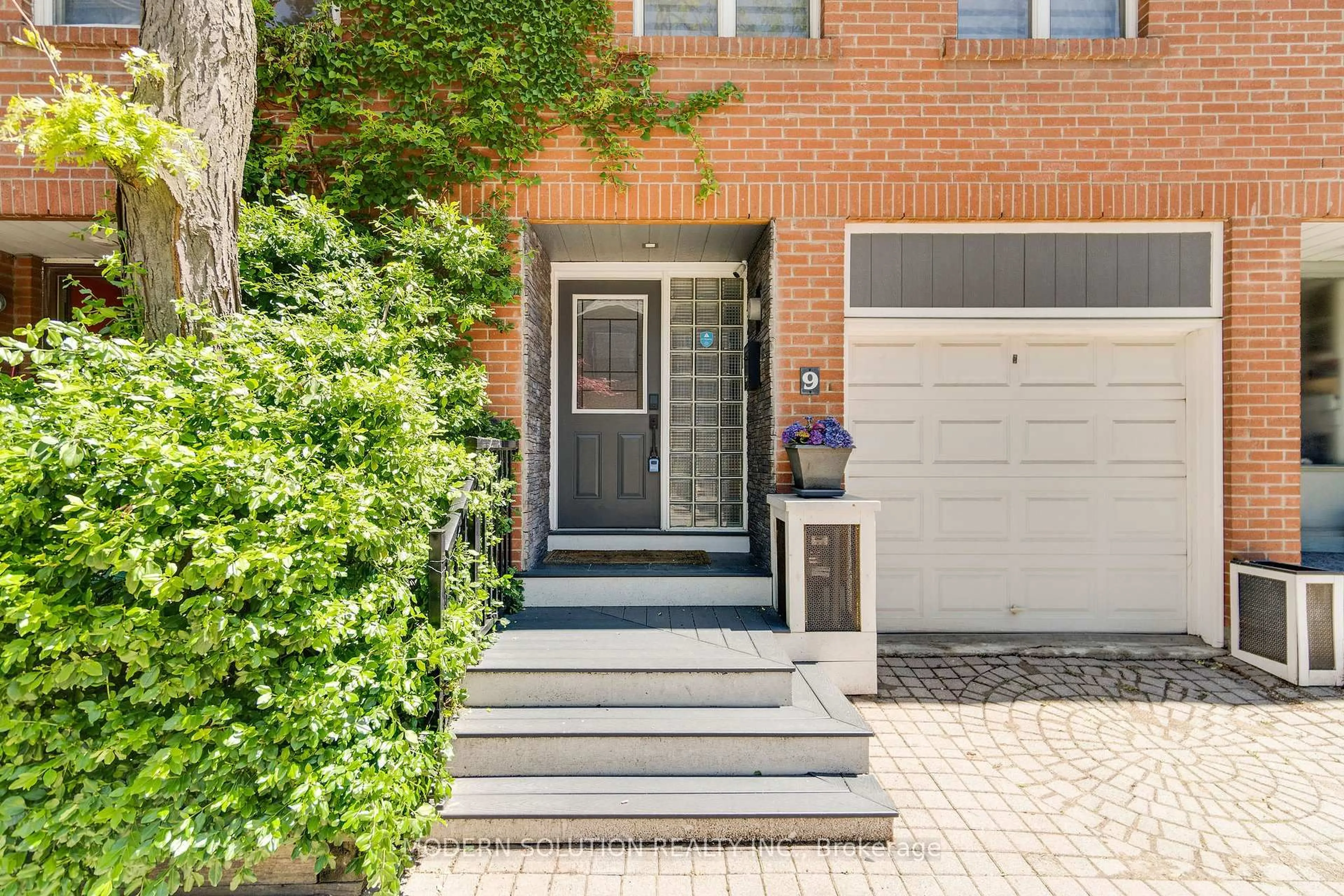 Home with brick exterior material, street for 9 Douville Crt, Toronto Ontario M5A 4E7