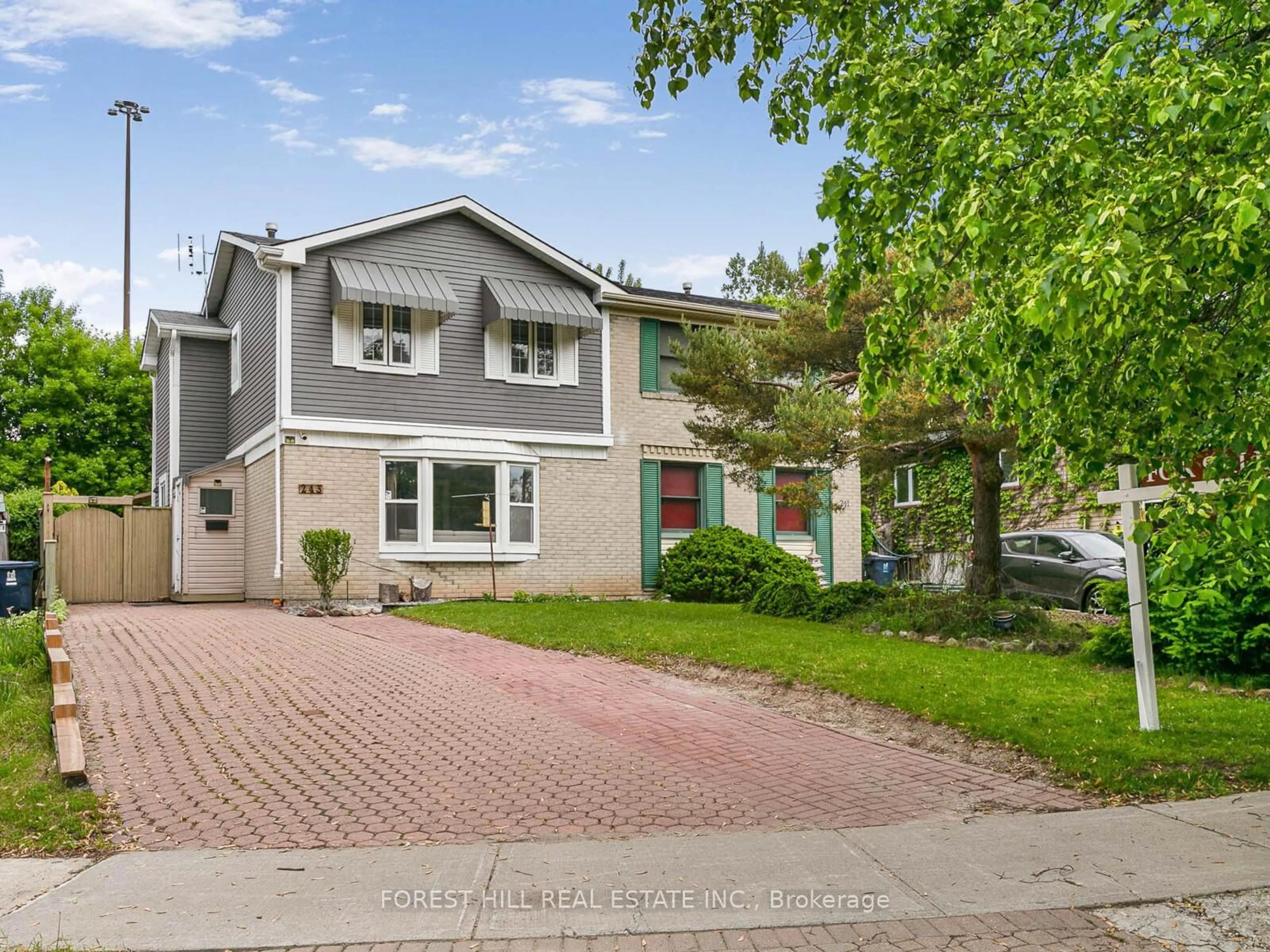 Home with brick exterior material, street for 243 Hollyberry Tr, Toronto Ontario M2H 2P3
