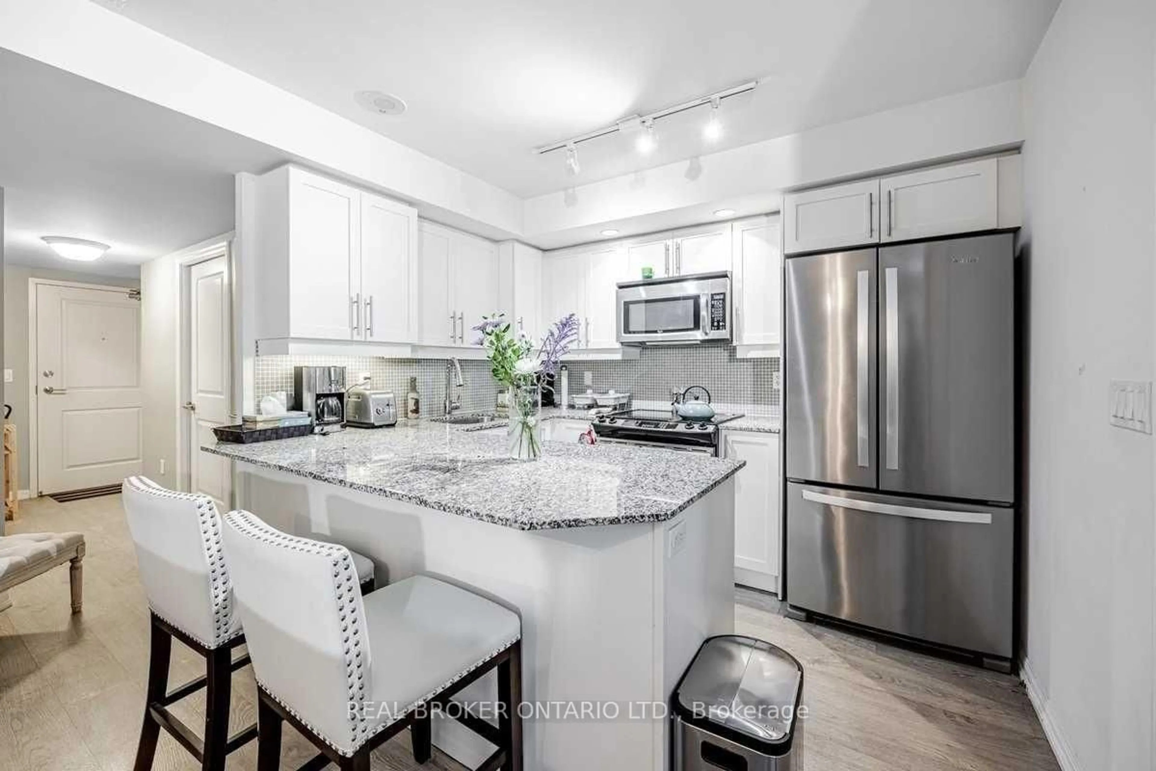 Open concept kitchen, ceramic/tile floor for 65 East Liberty St #217, Toronto Ontario M6K 3R2
