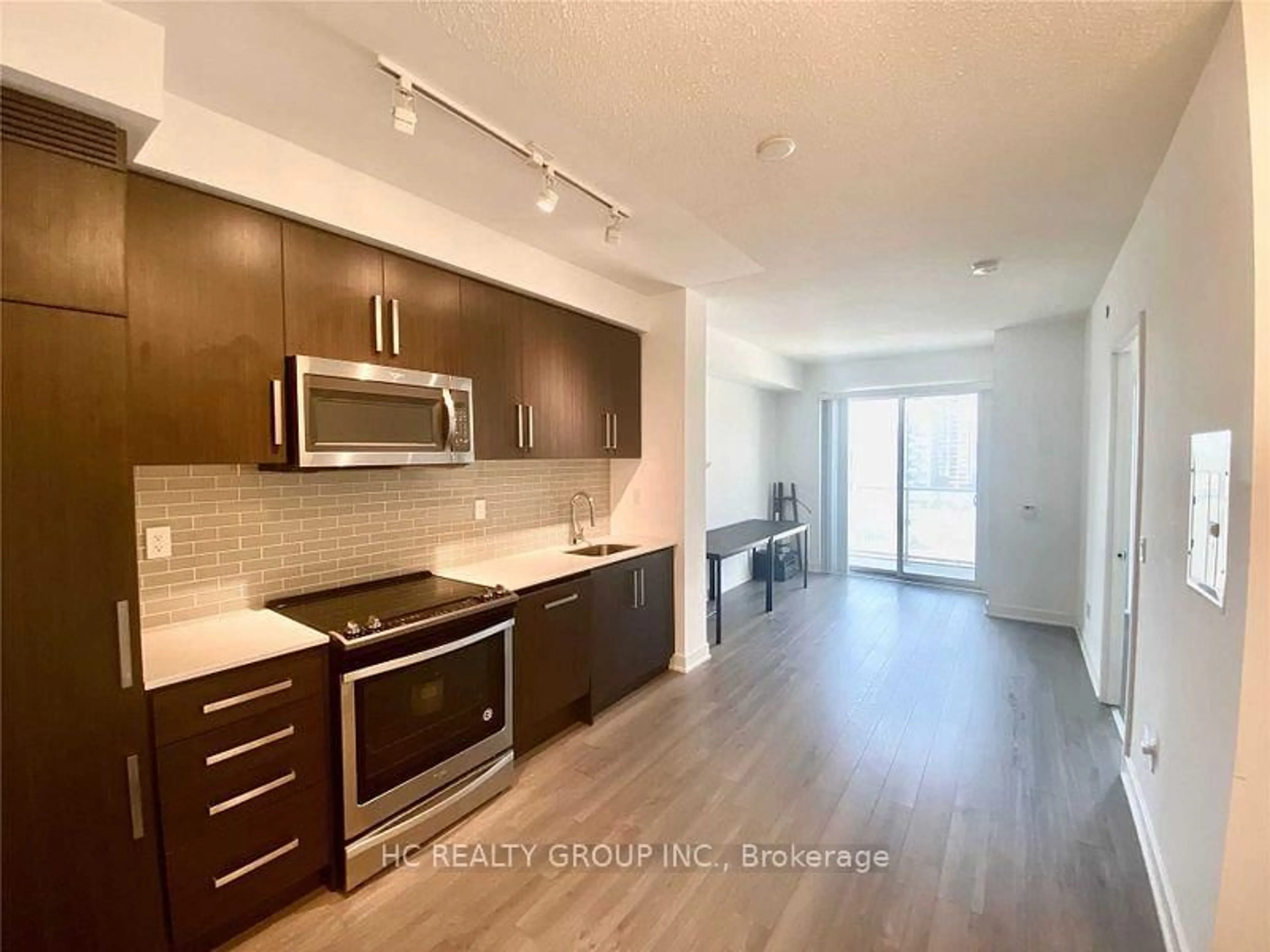 Open concept kitchen, wood/laminate floor for 5180 Yonge St #603, Toronto Ontario M2N 0K5