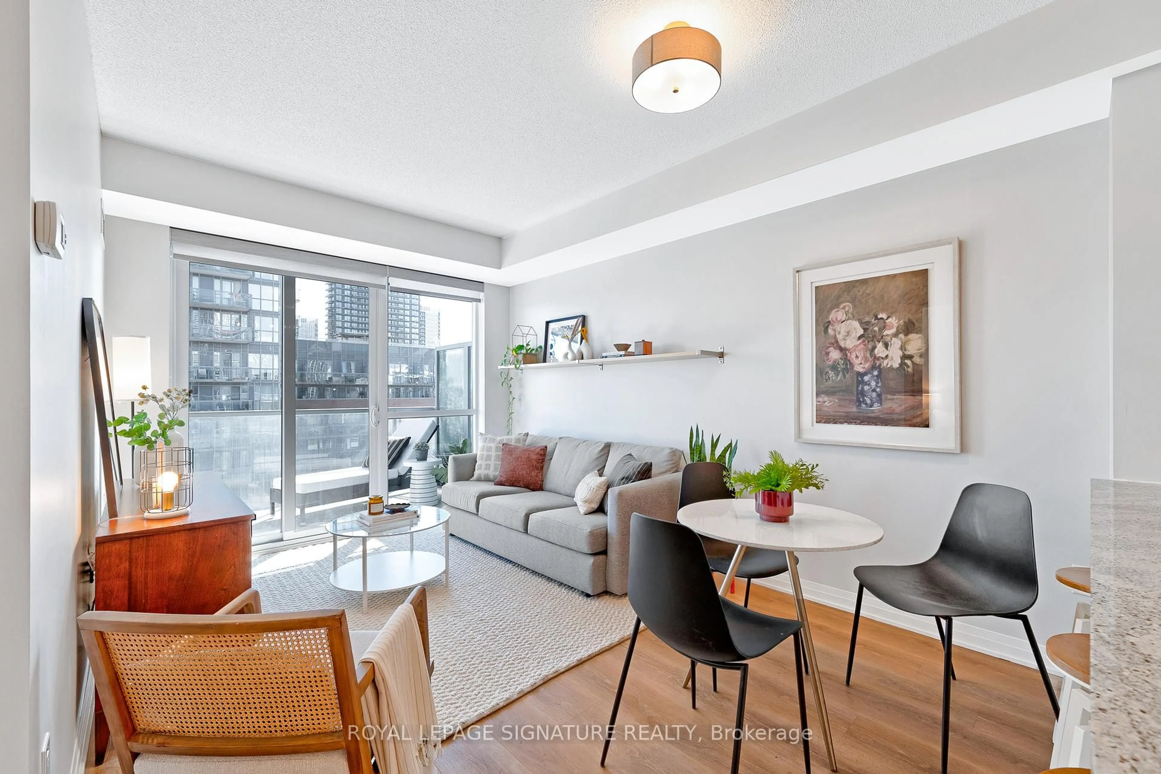 Living room with furniture, unknown for 1 Cole St #804, Toronto Ontario M5A 4M2