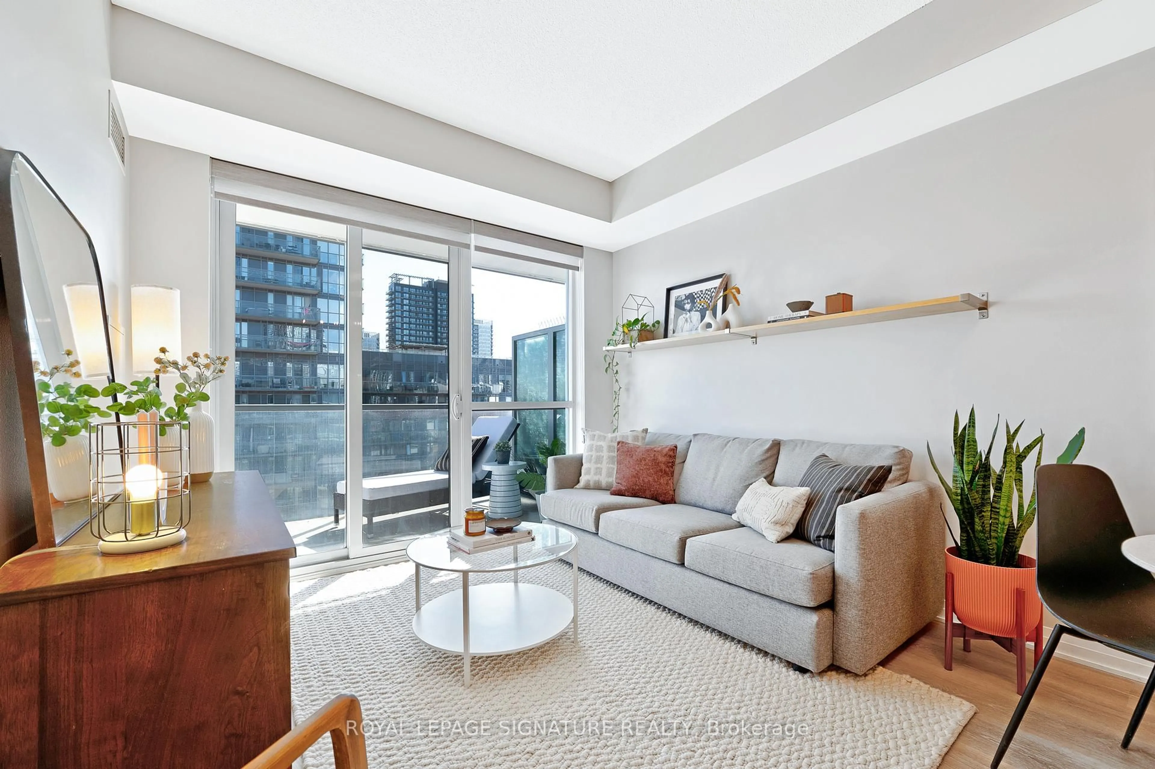 Living room with furniture, unknown for 1 Cole St #804, Toronto Ontario M5A 4M2