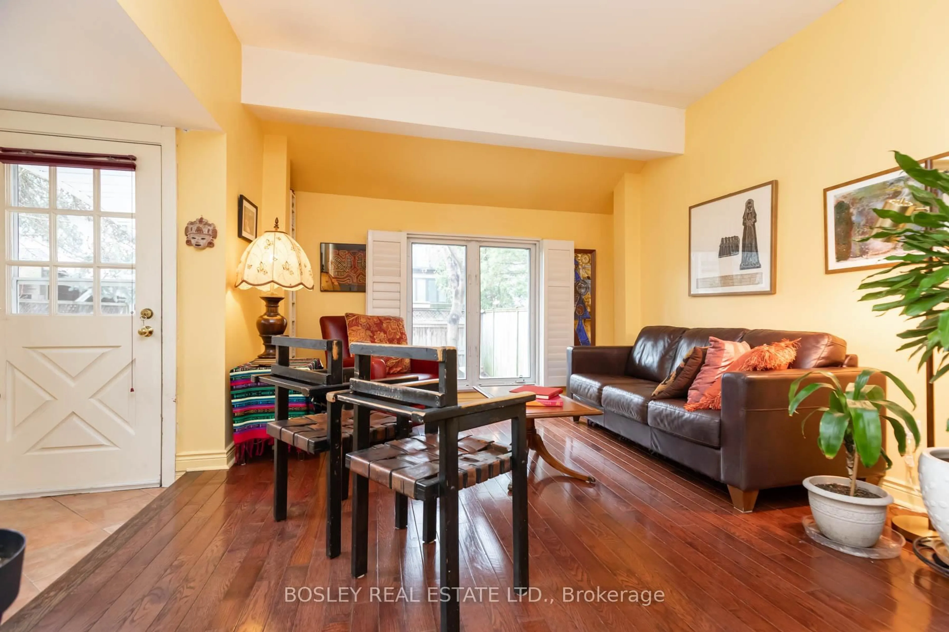 Living room with furniture, wood/laminate floor for 93 Amelia St, Toronto Ontario M4X 1E5