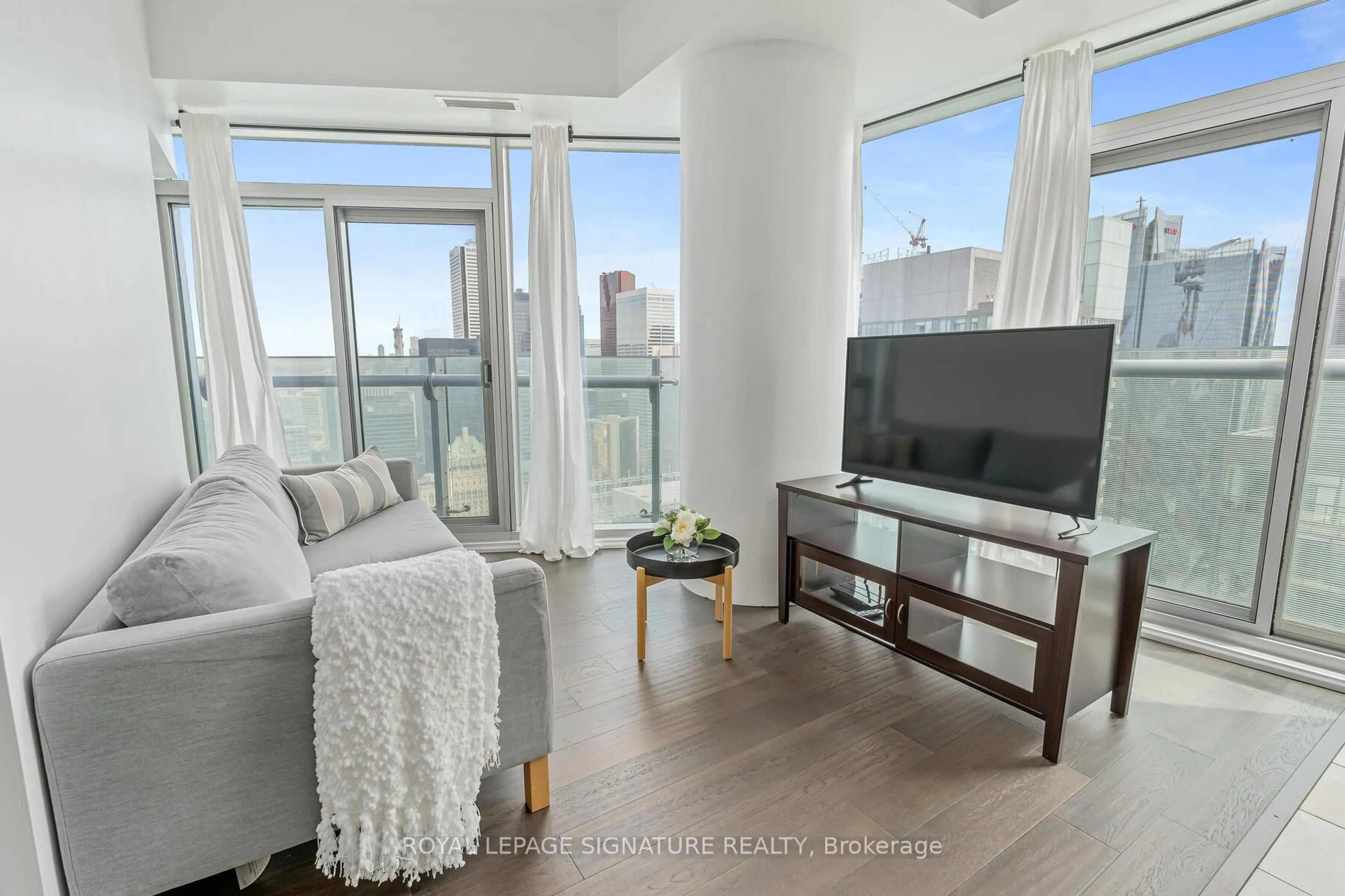 Living room with furniture, unknown for 14 York St #5211, Toronto Ontario M5J 0B1