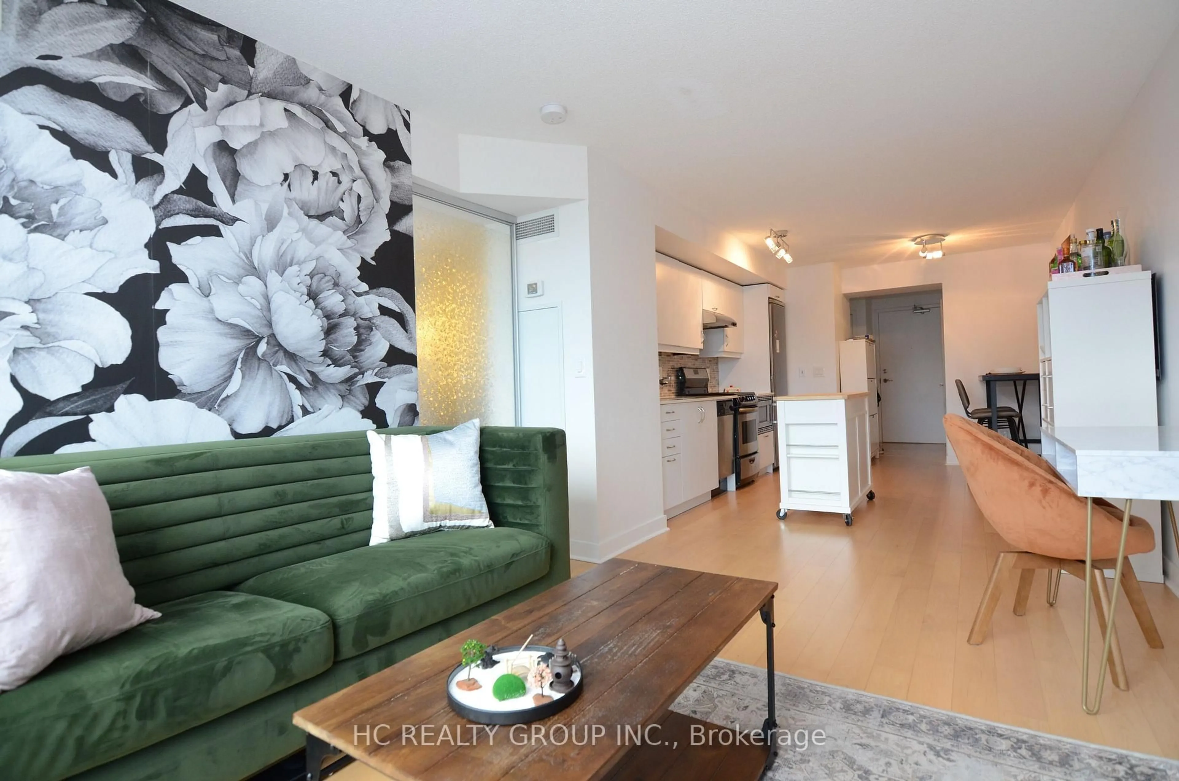 Living room with furniture, wood/laminate floor for 320 Richmond St #322, Toronto Ontario M5A 1P9