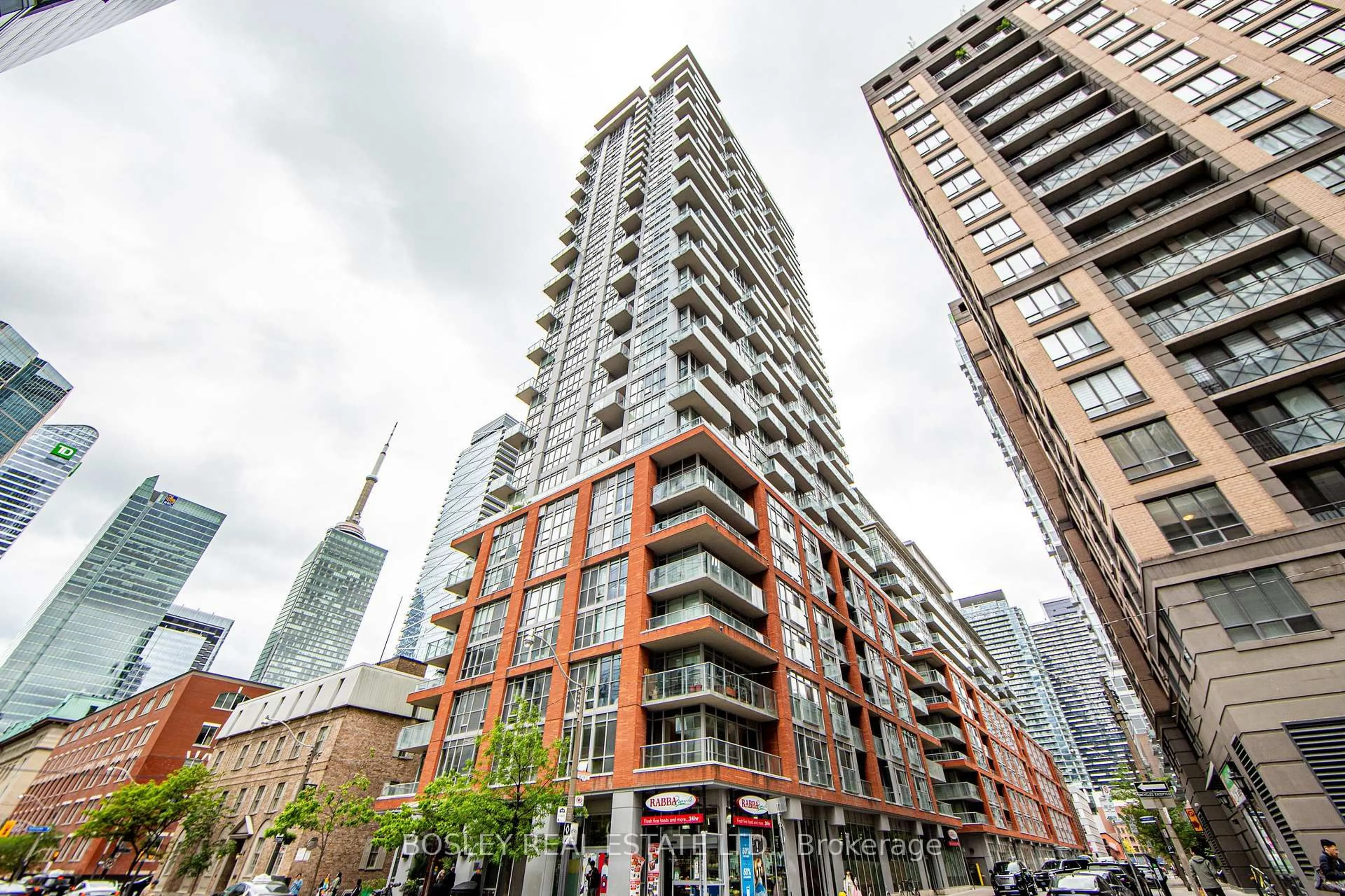 Patio, city buildings view from balcony for 126 Simcoe St #704, Toronto Ontario M5H 4E6