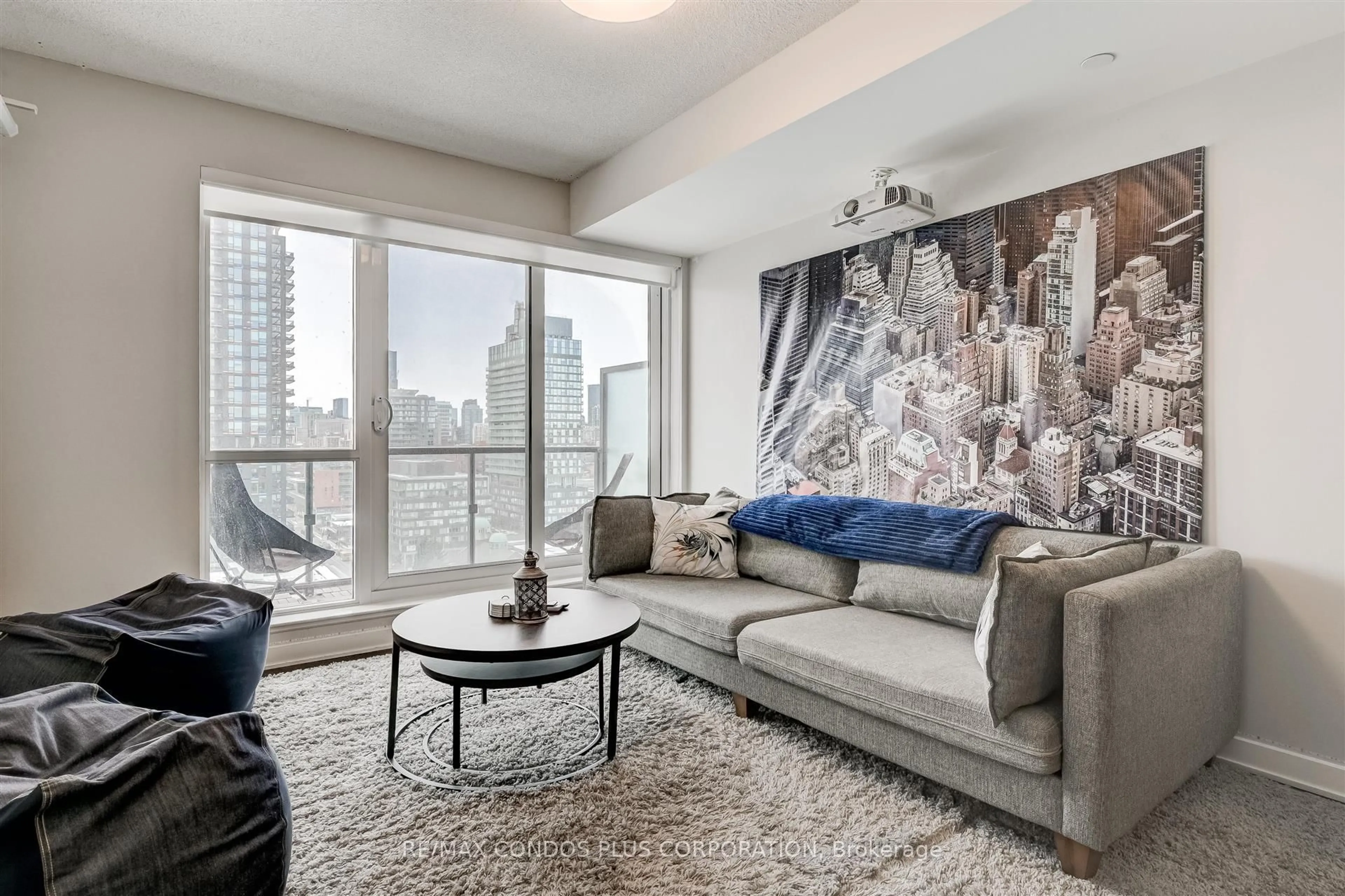 Living room with furniture, carpet floor for 170 Sumach St #1407, Toronto Ontario M5A 0C3
