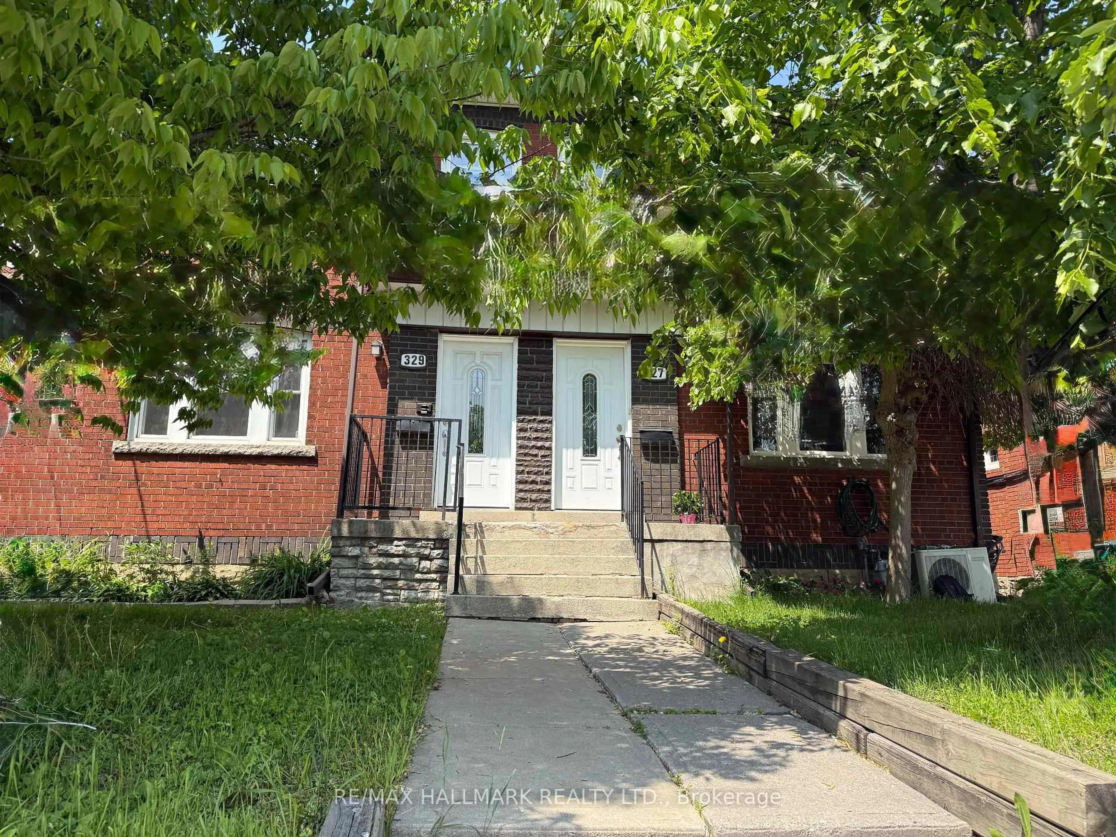 Home with brick exterior material, street for 329 Vaughan Rd, Toronto Ontario M6C 2N5