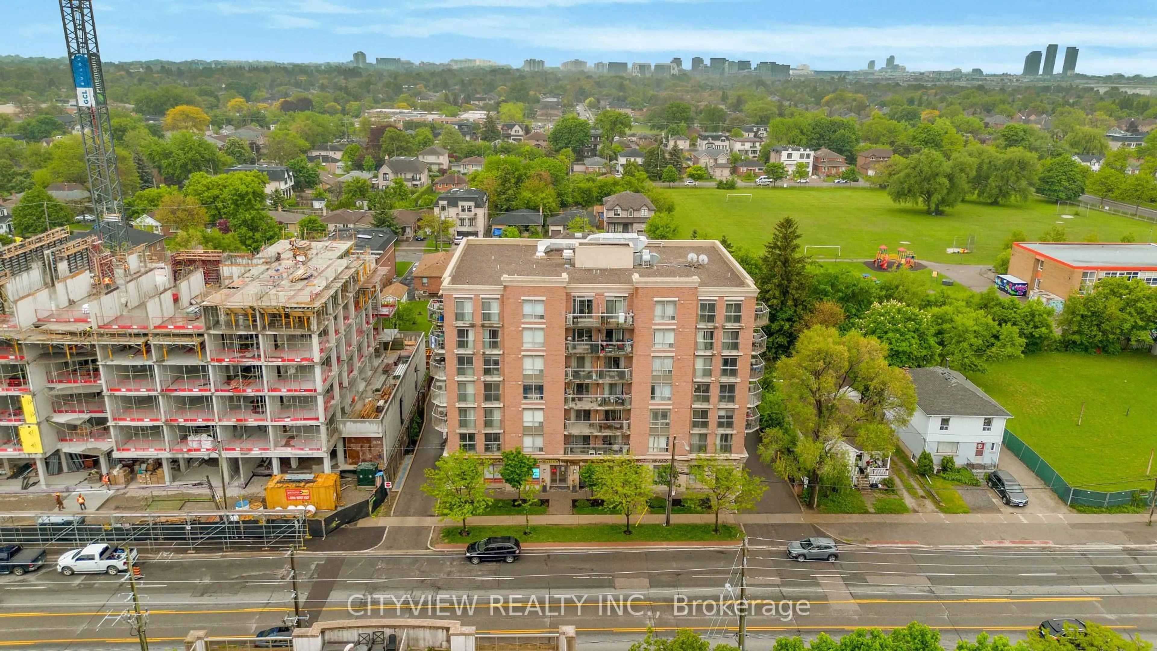 A pic from outside/outdoor area/front of a property/back of a property/a pic from drone, city buildings view from balcony for 801 Sheppard Ave #307, Toronto Ontario M3H 2T3
