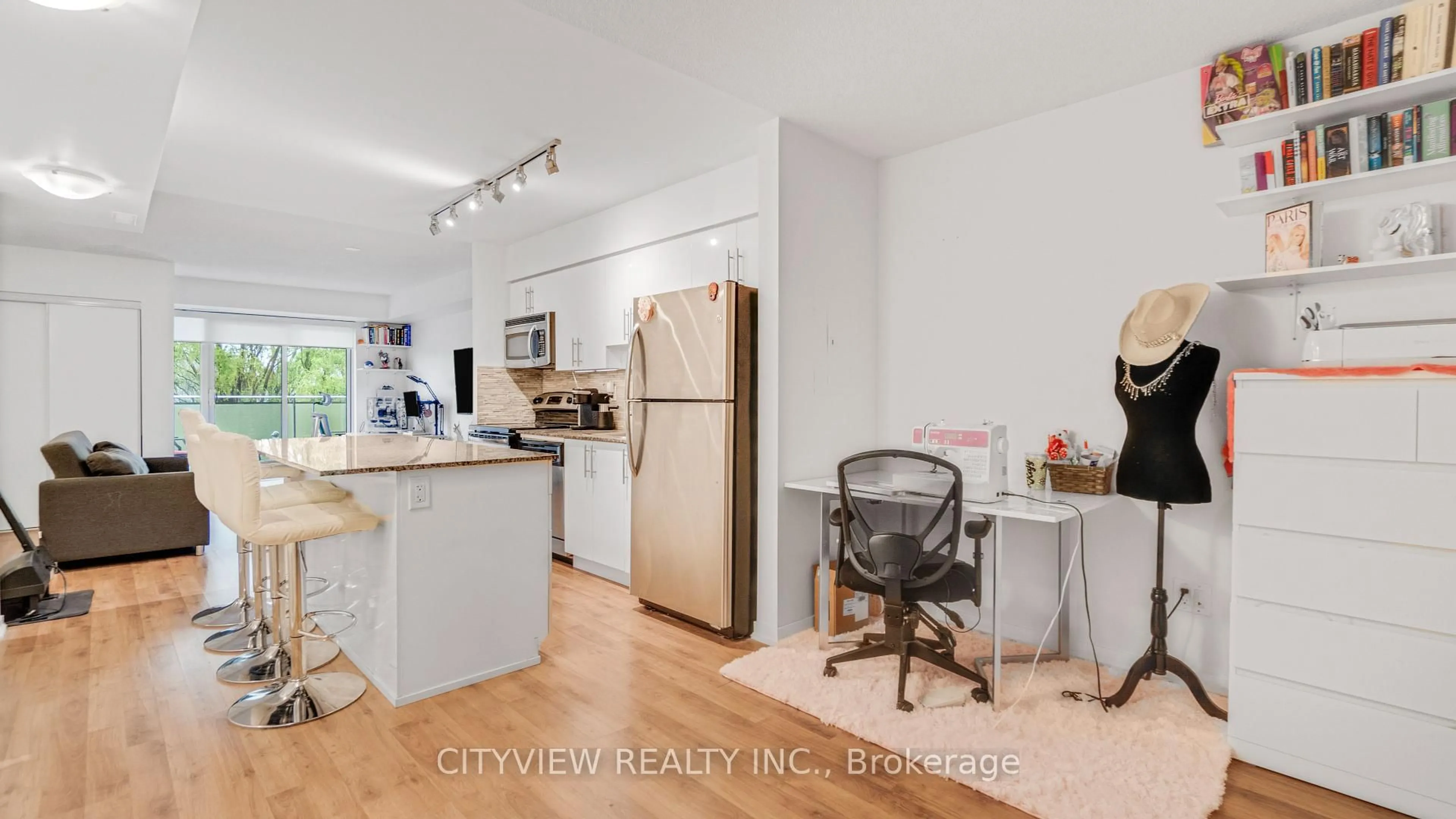 Open concept kitchen, wood/laminate floor for 801 Sheppard Ave #307, Toronto Ontario M3H 2T3